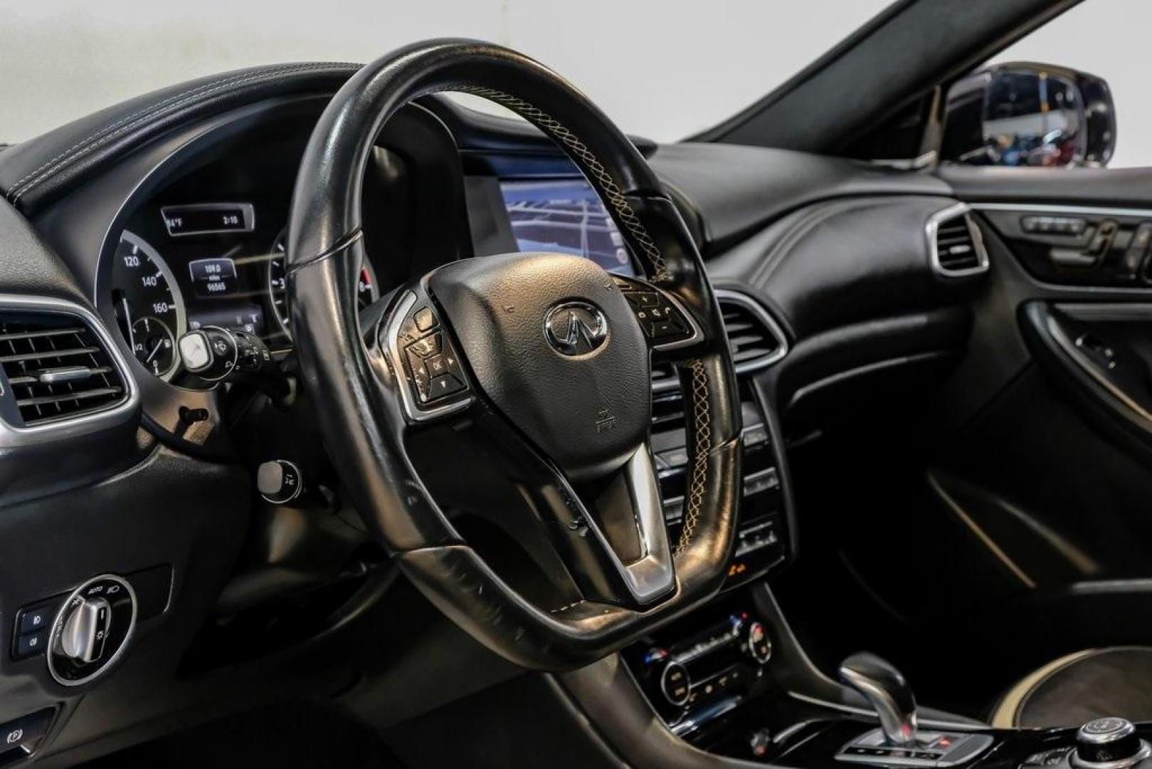 2019 Ink Blue /Graphite INFINITI QX30 Sport (SJKCH5CP8KA) with an 2.0L I4 DOHC Turbocharged engine, Automatic transmission, located at 15300 Midway Rd., Addison, TX, 75001, (972) 702-0011, 32.958321, -96.838074 - Photo#21