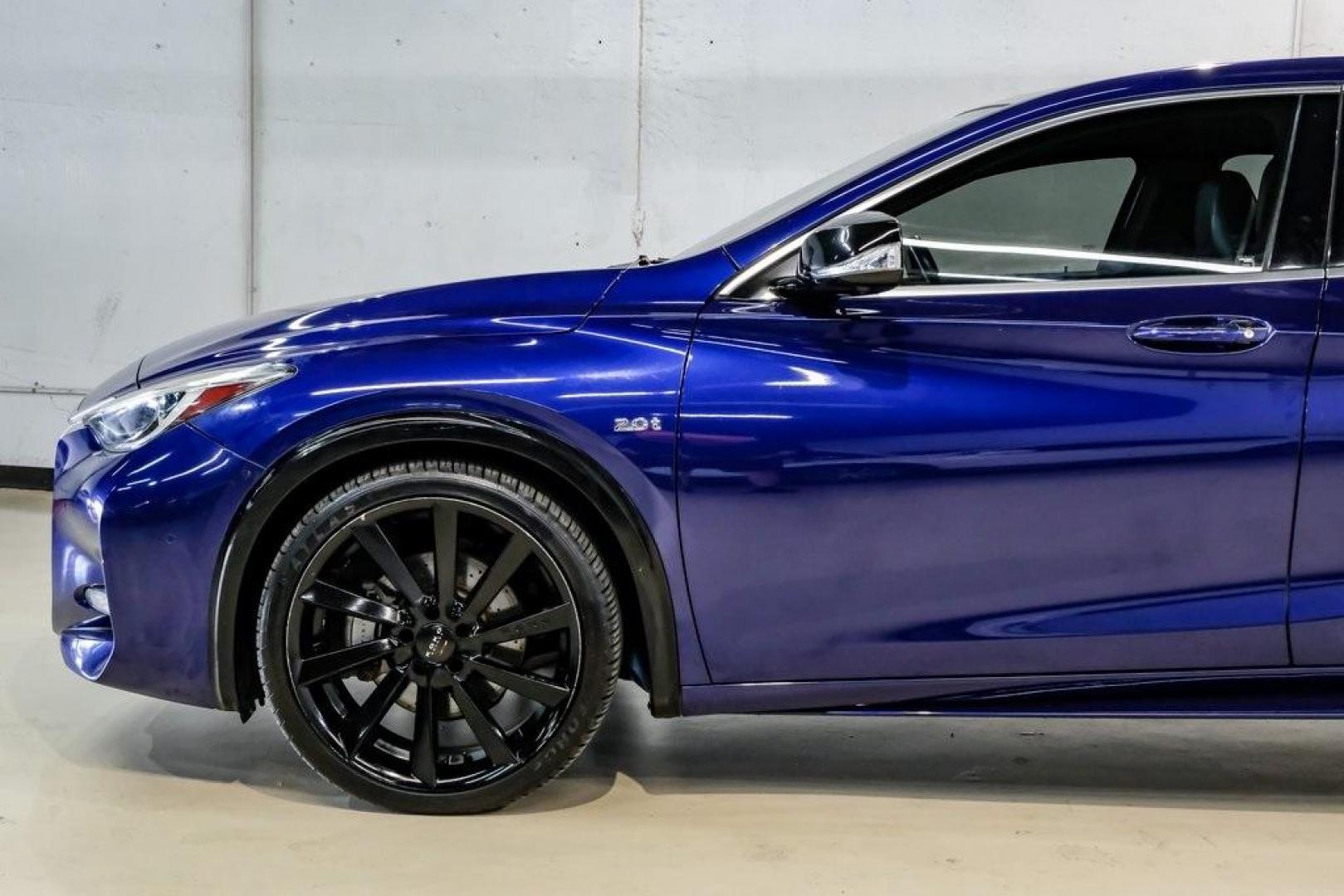 2019 Ink Blue /Graphite INFINITI QX30 Sport (SJKCH5CP8KA) with an 2.0L I4 DOHC Turbocharged engine, Automatic transmission, located at 15300 Midway Rd., Addison, TX, 75001, (972) 702-0011, 32.958321, -96.838074 - 2019 INFINITI QX30 Sport<br><br>Now Available at Midway Auto Group, Addison, Texas<br><br>Aggressive, athletic, and premium the 2019 INFINITI QX30 Sport stands out with its lower stance, sport-tuned suspension, upgraded interior, and bold styling enhancements. As the performance-oriented model in th - Photo#16