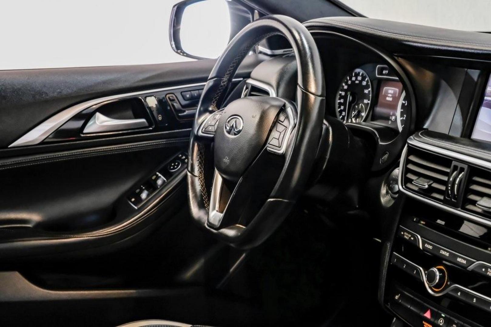 2019 Ink Blue /Graphite INFINITI QX30 Sport (SJKCH5CP8KA) with an 2.0L I4 DOHC Turbocharged engine, Automatic transmission, located at 15300 Midway Rd., Addison, TX, 75001, (972) 702-0011, 32.958321, -96.838074 - 2019 INFINITI QX30 Sport<br><br>Now Available at Midway Auto Group, Addison, Texas<br><br>Aggressive, athletic, and premium the 2019 INFINITI QX30 Sport stands out with its lower stance, sport-tuned suspension, upgraded interior, and bold styling enhancements. As the performance-oriented model in th - Photo#19