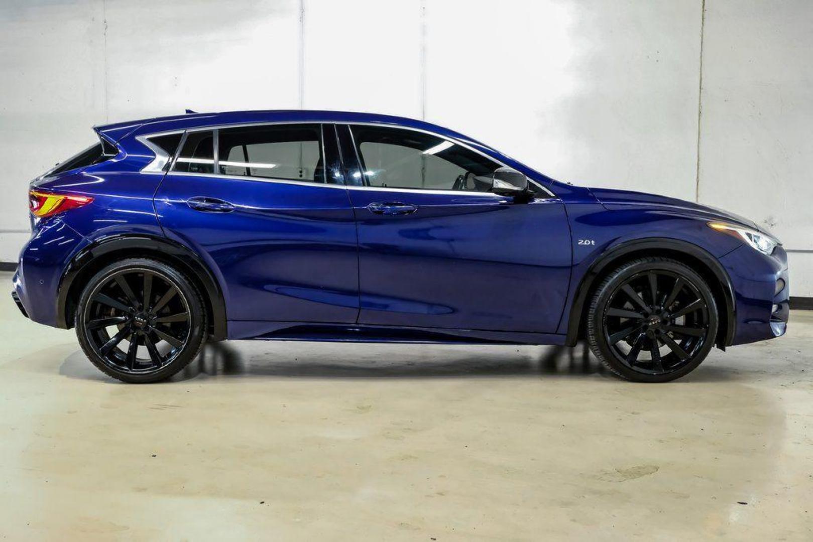 2019 Ink Blue /Graphite INFINITI QX30 Sport (SJKCH5CP8KA) with an 2.0L I4 DOHC Turbocharged engine, Automatic transmission, located at 15300 Midway Rd., Addison, TX, 75001, (972) 702-0011, 32.958321, -96.838074 - 2019 INFINITI QX30 Sport<br><br>Now Available at Midway Auto Group, Addison, Texas<br><br>Aggressive, athletic, and premium the 2019 INFINITI QX30 Sport stands out with its lower stance, sport-tuned suspension, upgraded interior, and bold styling enhancements. As the performance-oriented model in th - Photo#9