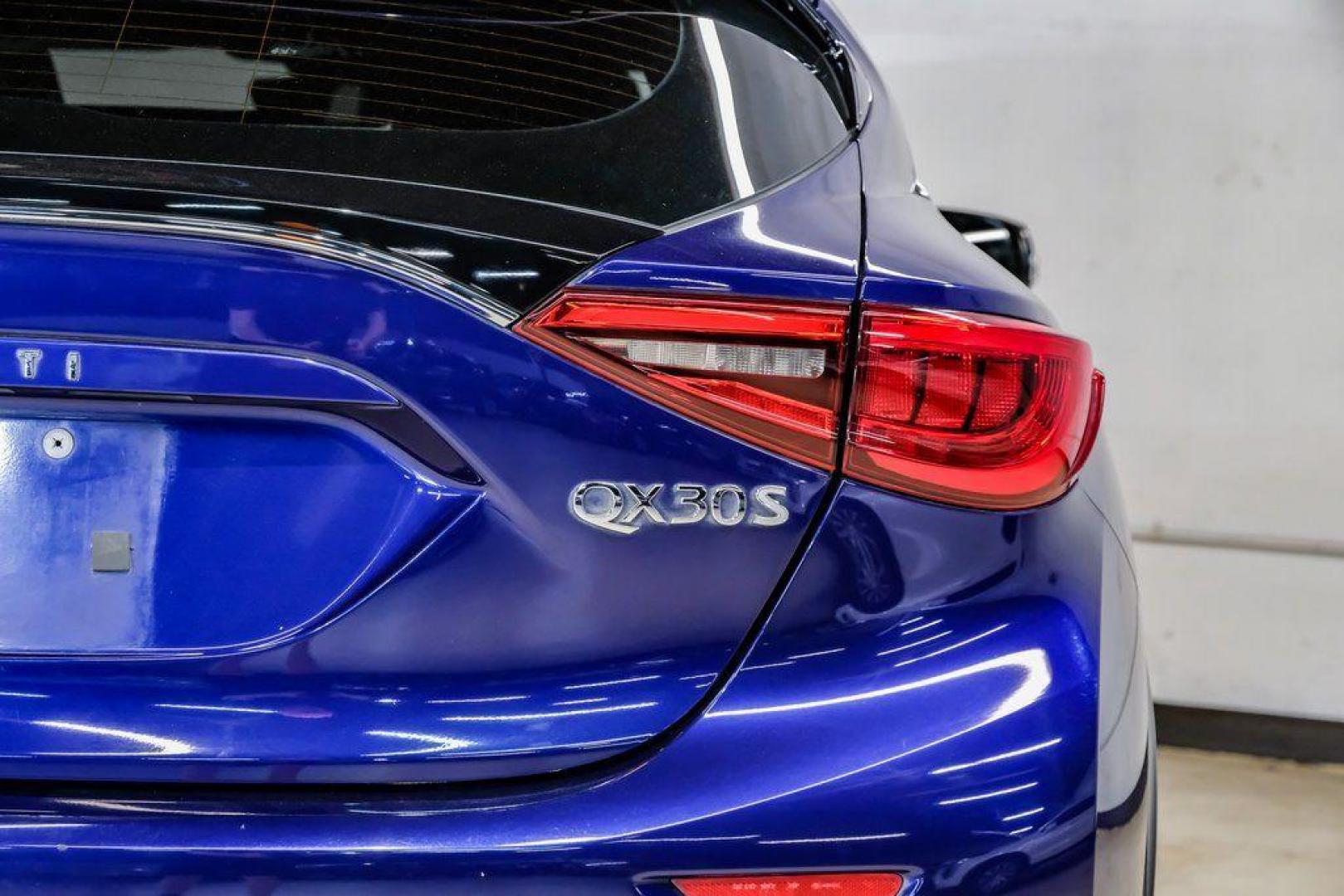 2019 Ink Blue /Graphite INFINITI QX30 Sport (SJKCH5CP8KA) with an 2.0L I4 DOHC Turbocharged engine, Automatic transmission, located at 15300 Midway Rd., Addison, TX, 75001, (972) 702-0011, 32.958321, -96.838074 - 2019 INFINITI QX30 Sport<br><br>Now Available at Midway Auto Group, Addison, Texas<br><br>Aggressive, athletic, and premium the 2019 INFINITI QX30 Sport stands out with its lower stance, sport-tuned suspension, upgraded interior, and bold styling enhancements. As the performance-oriented model in th - Photo#55