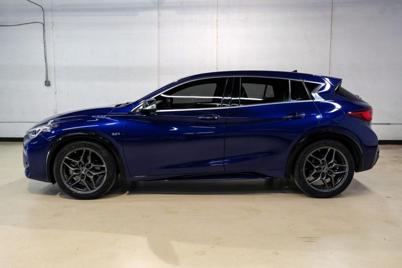 2019 Ink Blue /Graphite INFINITI QX30 Sport (SJKCH5CP8KA) with an 2.0L I4 DOHC Turbocharged engine, Automatic transmission, located at 15300 Midway Rd., Addison, TX, 75001, (972) 702-0011, 32.958321, -96.838074 - 2019 INFINITI QX30 Sport<br><br>Now Available at Midway Auto Group, Addison, Texas<br><br>Aggressive, athletic, and premium the 2019 INFINITI QX30 Sport stands out with its lower stance, sport-tuned suspension, upgraded interior, and bold styling enhancements. As the performance-oriented model in th - Photo#11