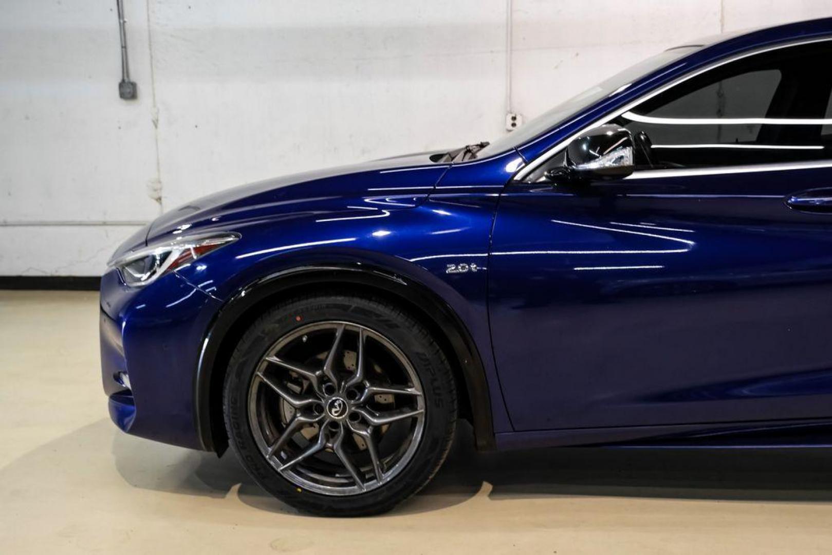 2019 Ink Blue /Graphite INFINITI QX30 Sport (SJKCH5CP8KA) with an 2.0L I4 DOHC Turbocharged engine, Automatic transmission, located at 15300 Midway Rd., Addison, TX, 75001, (972) 702-0011, 32.958321, -96.838074 - 2019 INFINITI QX30 Sport<br><br>Now Available at Midway Auto Group, Addison, Texas<br><br>Aggressive, athletic, and premium the 2019 INFINITI QX30 Sport stands out with its lower stance, sport-tuned suspension, upgraded interior, and bold styling enhancements. As the performance-oriented model in th - Photo#12
