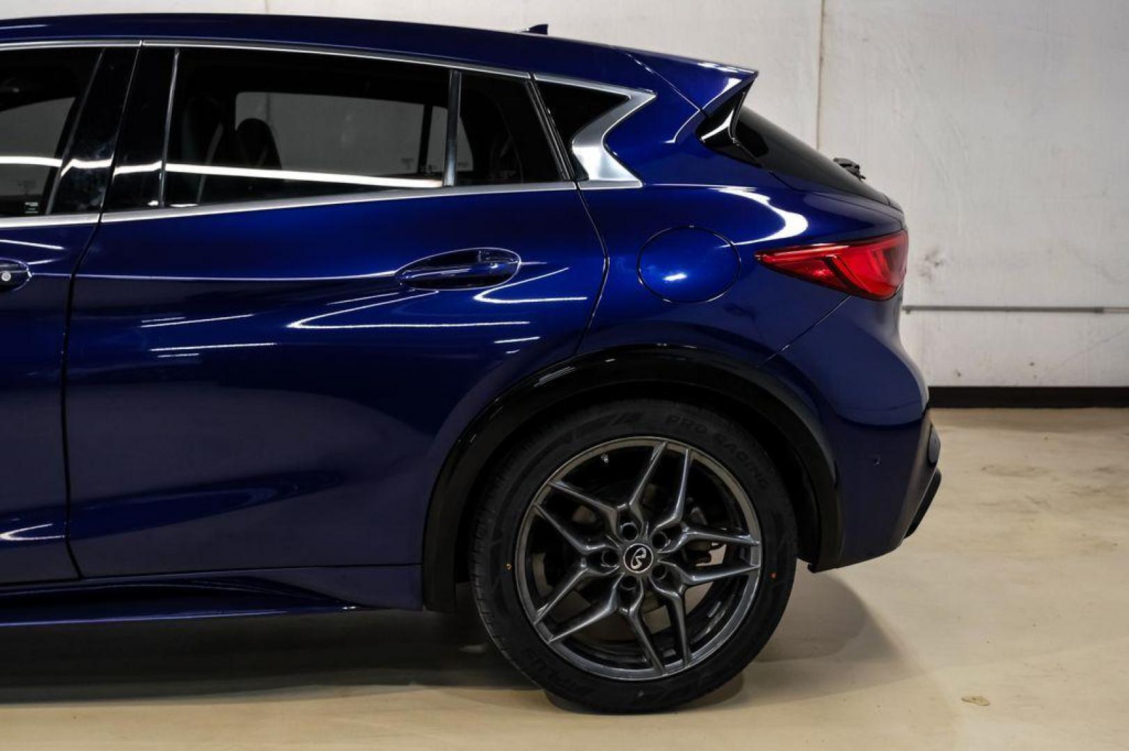 2019 Ink Blue /Graphite INFINITI QX30 Sport (SJKCH5CP8KA) with an 2.0L I4 DOHC Turbocharged engine, Automatic transmission, located at 15300 Midway Rd., Addison, TX, 75001, (972) 702-0011, 32.958321, -96.838074 - 2019 INFINITI QX30 Sport<br><br>Now Available at Midway Auto Group, Addison, Texas<br><br>Aggressive, athletic, and premium the 2019 INFINITI QX30 Sport stands out with its lower stance, sport-tuned suspension, upgraded interior, and bold styling enhancements. As the performance-oriented model in th - Photo#13