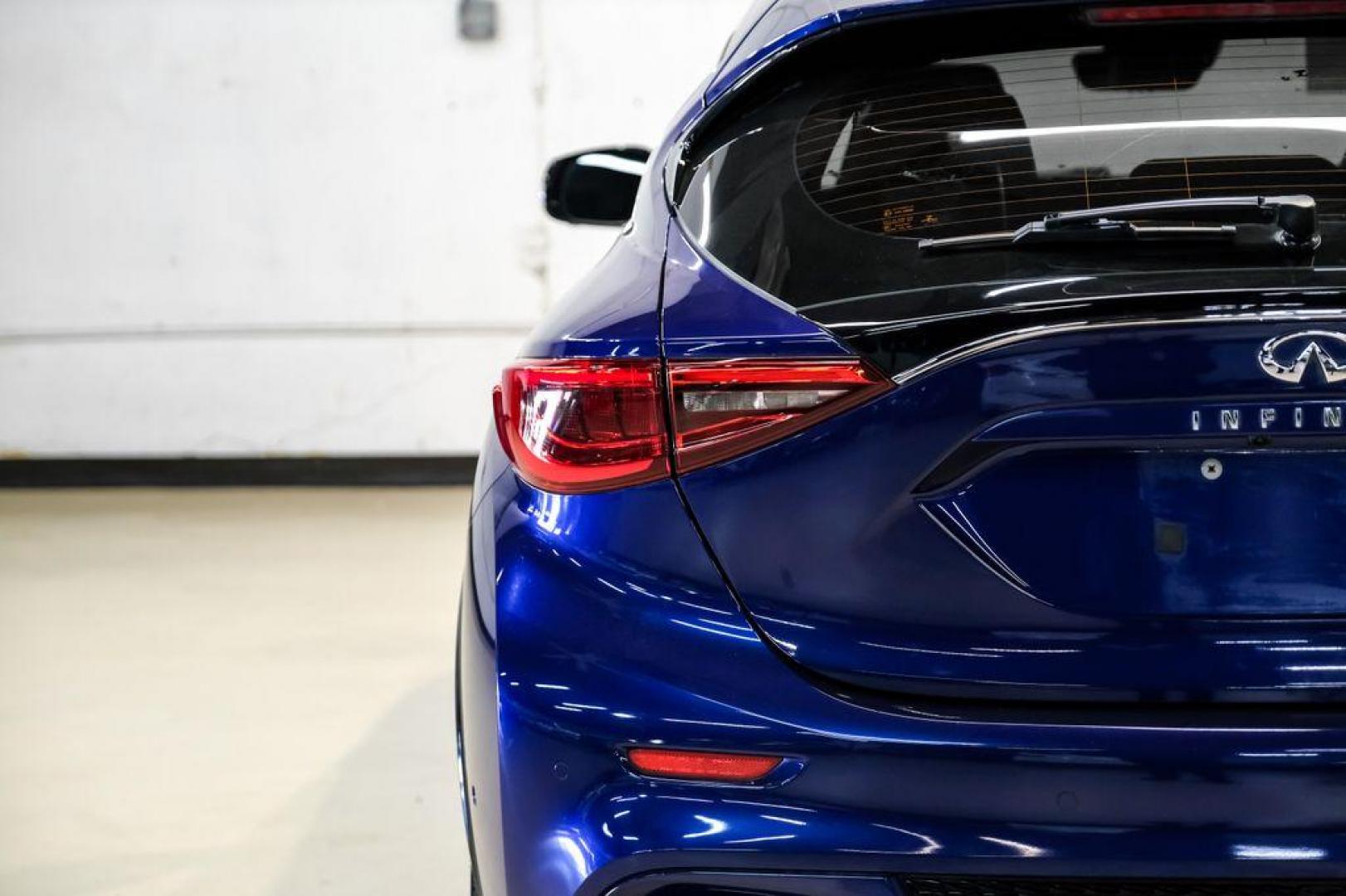 2019 Ink Blue /Graphite INFINITI QX30 Sport (SJKCH5CP8KA) with an 2.0L I4 DOHC Turbocharged engine, Automatic transmission, located at 15300 Midway Rd., Addison, TX, 75001, (972) 702-0011, 32.958321, -96.838074 - 2019 INFINITI QX30 Sport<br><br>Now Available at Midway Auto Group, Addison, Texas<br><br>Aggressive, athletic, and premium the 2019 INFINITI QX30 Sport stands out with its lower stance, sport-tuned suspension, upgraded interior, and bold styling enhancements. As the performance-oriented model in th - Photo#52