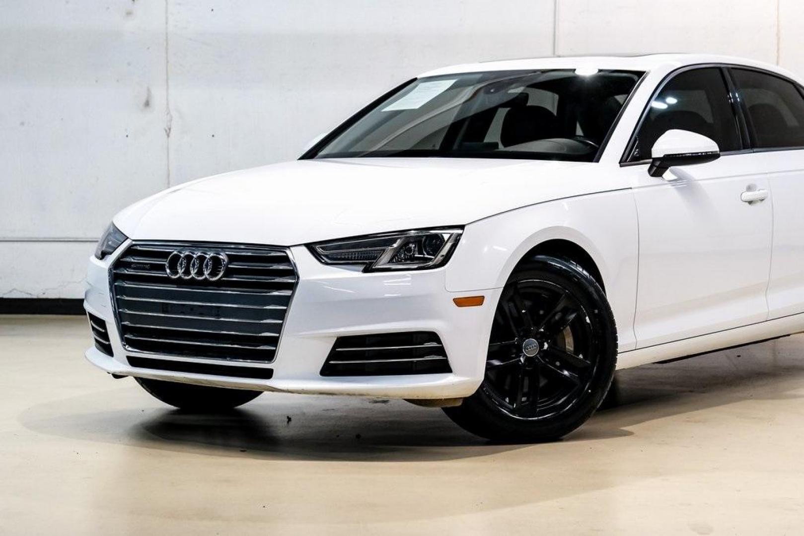2017 Ibis White /Black Audi A4 2.0T Premium (WAUANAF49HN) with an 2.0L I4 TFSI DOHC engine, Automatic transmission, located at 15300 Midway Rd., Addison, TX, 75001, (972) 702-0011, 32.958321, -96.838074 - 2017 Audi A4 2.0T Premium<br><br>Now Available at Midway Auto Group, Addison, Texas<br><br>Refined, efficient, and unmistakably Audi the 2017 Audi A4 Premium delivers a luxury driving experience with smooth turbocharged performance, a high-quality interior, and advanced technology throughout. With c - Photo#5