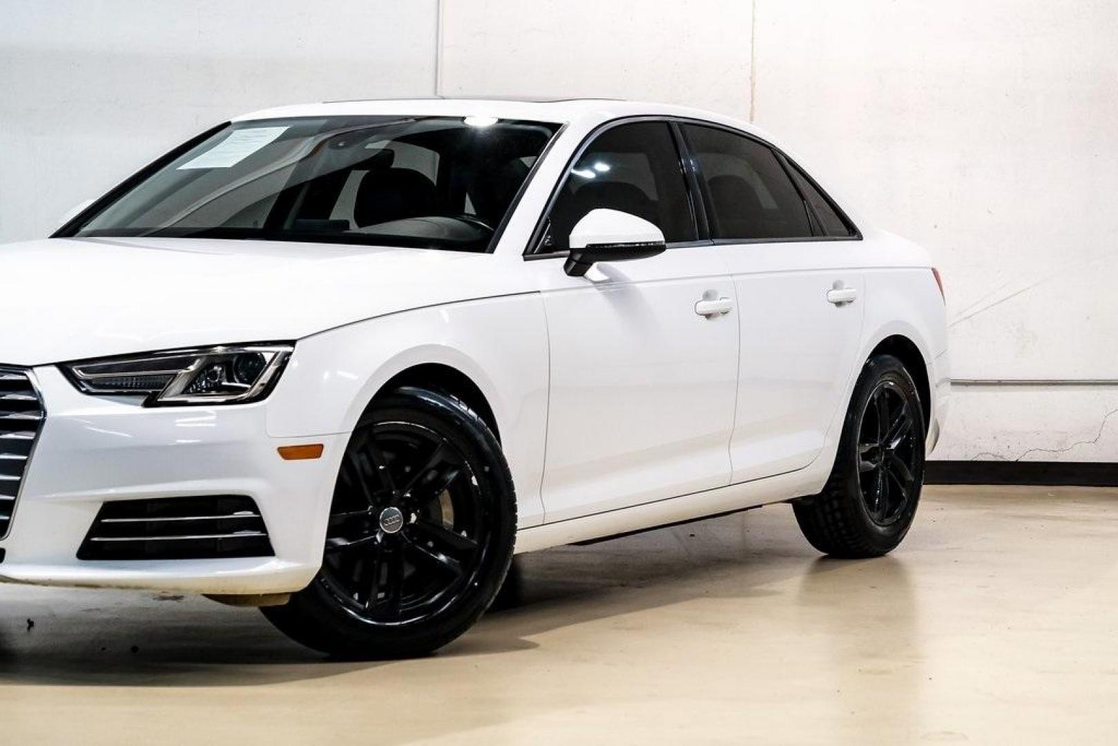 2017 Ibis White /Black Audi A4 2.0T Premium (WAUANAF49HN) with an 2.0L I4 TFSI DOHC engine, Automatic transmission, located at 15300 Midway Rd., Addison, TX, 75001, (972) 702-0011, 32.958321, -96.838074 - 2017 Audi A4 2.0T Premium<br><br>Now Available at Midway Auto Group, Addison, Texas<br><br>Refined, efficient, and unmistakably Audi the 2017 Audi A4 Premium delivers a luxury driving experience with smooth turbocharged performance, a high-quality interior, and advanced technology throughout. With c - Photo#6