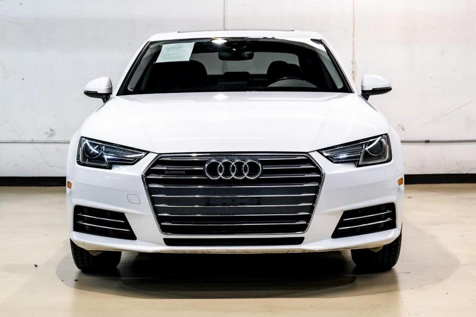 2017 Ibis White /Black Audi A4 2.0T Premium (WAUANAF49HN) with an 2.0L I4 TFSI DOHC engine, Automatic transmission, located at 15300 Midway Rd., Addison, TX, 75001, (972) 702-0011, 32.958321, -96.838074 - 2017 Audi A4 2.0T Premium<br><br>Now Available at Midway Auto Group, Addison, Texas<br><br>Refined, efficient, and unmistakably Audi the 2017 Audi A4 Premium delivers a luxury driving experience with smooth turbocharged performance, a high-quality interior, and advanced technology throughout. With c - Photo#7