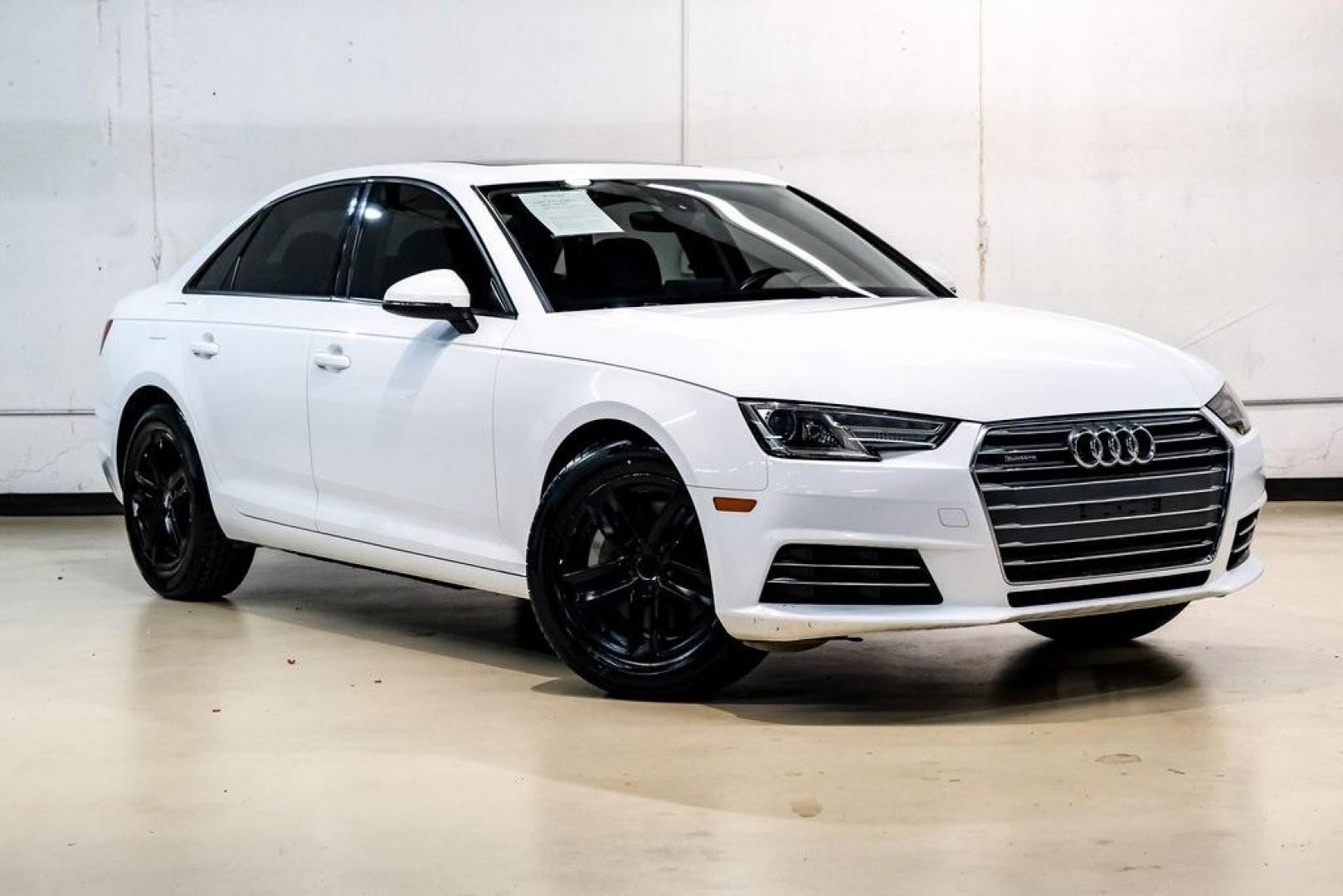 2017 Ibis White /Black Audi A4 2.0T Premium (WAUANAF49HN) with an 2.0L I4 TFSI DOHC engine, Automatic transmission, located at 15300 Midway Rd., Addison, TX, 75001, (972) 702-0011, 32.958321, -96.838074 - 2017 Audi A4 2.0T Premium<br><br>Now Available at Midway Auto Group, Addison, Texas<br><br>Refined, efficient, and unmistakably Audi the 2017 Audi A4 Premium delivers a luxury driving experience with smooth turbocharged performance, a high-quality interior, and advanced technology throughout. With c - Photo#8
