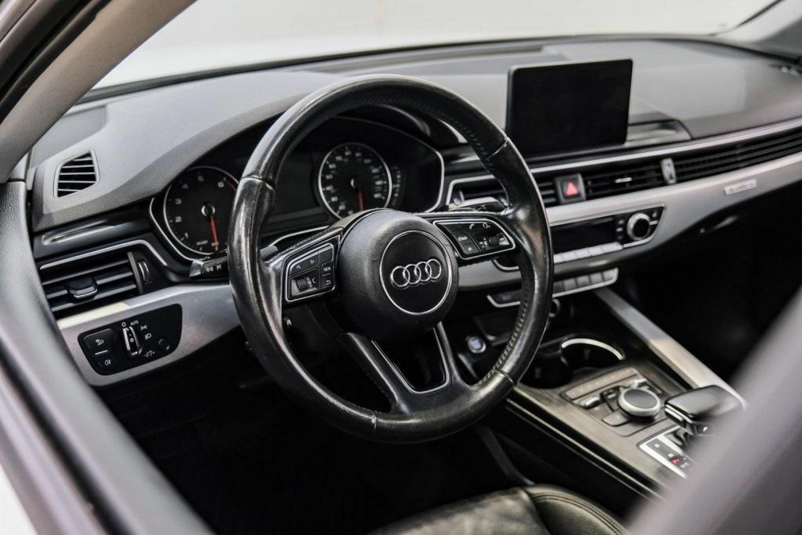 2017 Ibis White /Black Audi A4 2.0T Premium (WAUANAF49HN) with an 2.0L I4 TFSI DOHC engine, Automatic transmission, located at 15300 Midway Rd., Addison, TX, 75001, (972) 702-0011, 32.958321, -96.838074 - 2017 Audi A4 2.0T Premium<br><br>Now Available at Midway Auto Group, Addison, Texas<br><br>Refined, efficient, and unmistakably Audi the 2017 Audi A4 Premium delivers a luxury driving experience with smooth turbocharged performance, a high-quality interior, and advanced technology throughout. With c - Photo#21