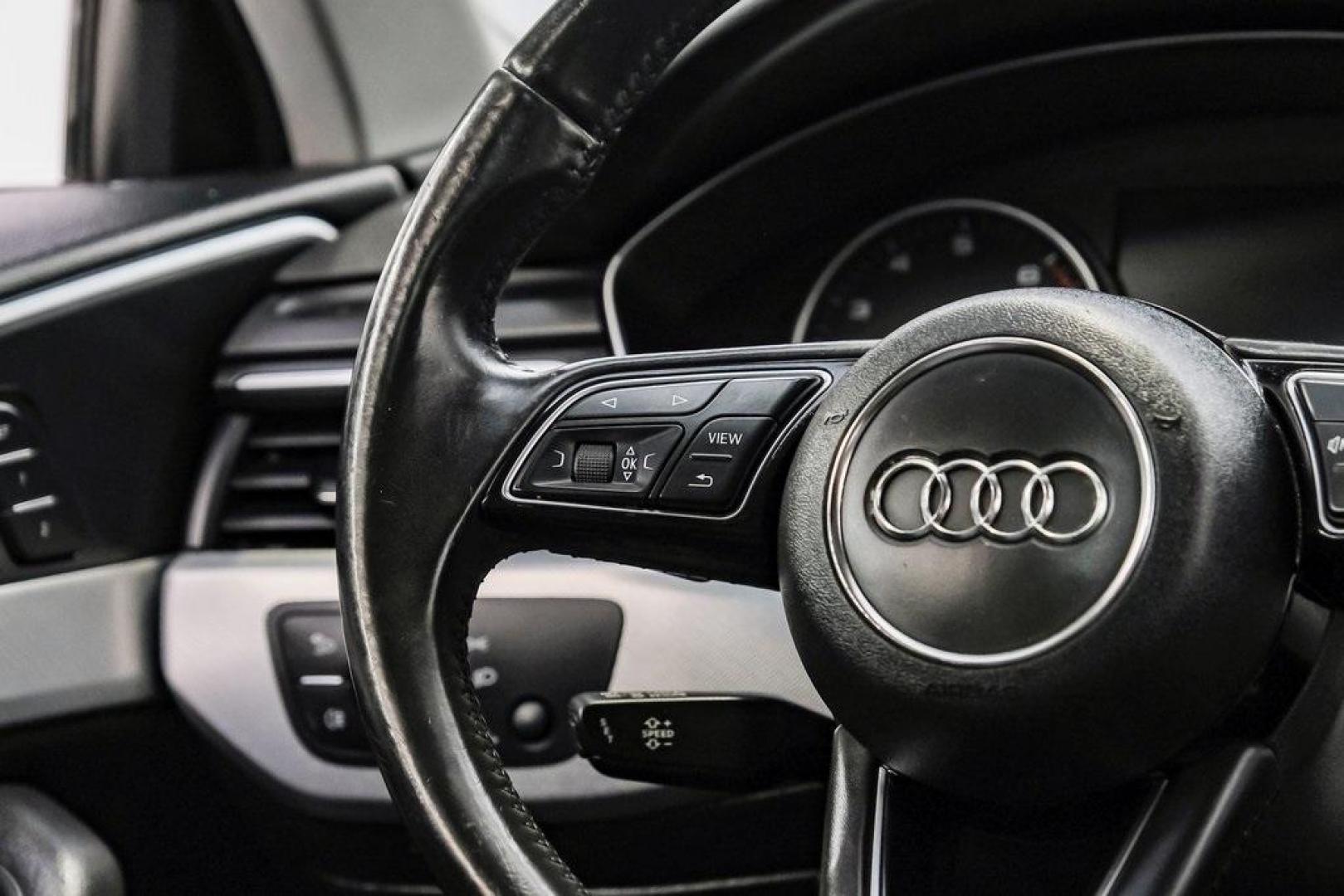 2017 Ibis White /Black Audi A4 2.0T Premium (WAUANAF49HN) with an 2.0L I4 TFSI DOHC engine, Automatic transmission, located at 15300 Midway Rd., Addison, TX, 75001, (972) 702-0011, 32.958321, -96.838074 - 2017 Audi A4 2.0T Premium<br><br>Now Available at Midway Auto Group, Addison, Texas<br><br>Refined, efficient, and unmistakably Audi the 2017 Audi A4 Premium delivers a luxury driving experience with smooth turbocharged performance, a high-quality interior, and advanced technology throughout. With c - Photo#23