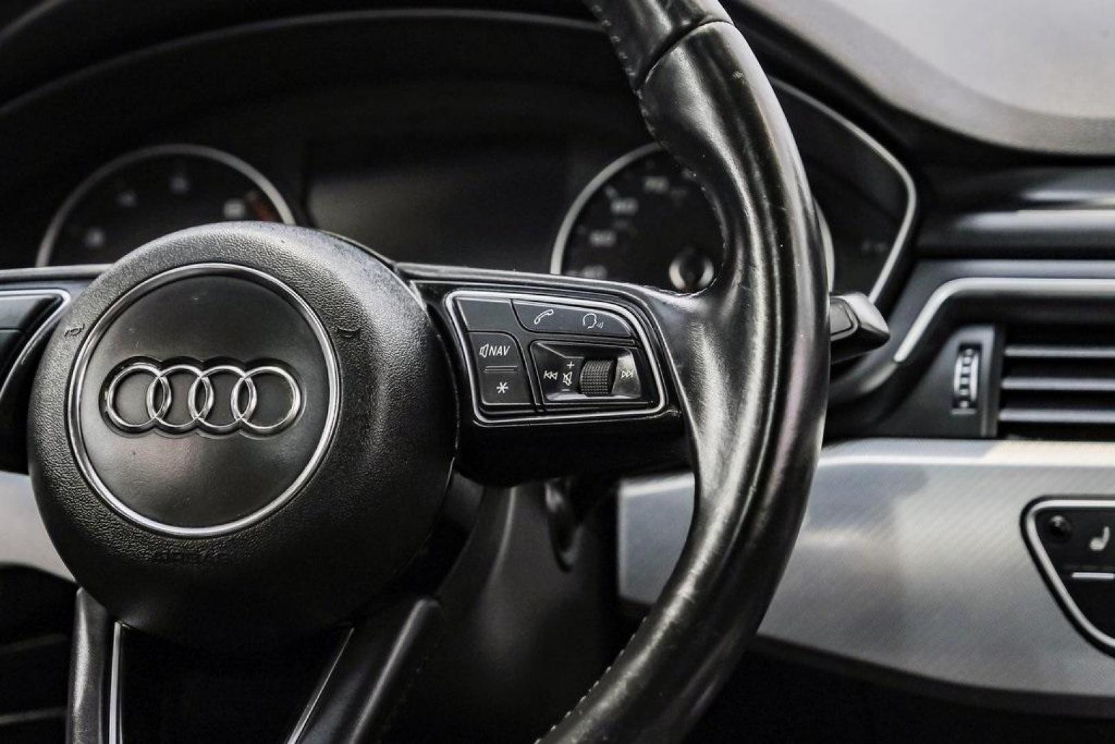 2017 Ibis White /Black Audi A4 2.0T Premium (WAUANAF49HN) with an 2.0L I4 TFSI DOHC engine, Automatic transmission, located at 15300 Midway Rd., Addison, TX, 75001, (972) 702-0011, 32.958321, -96.838074 - 2017 Audi A4 2.0T Premium<br><br>Now Available at Midway Auto Group, Addison, Texas<br><br>Refined, efficient, and unmistakably Audi the 2017 Audi A4 Premium delivers a luxury driving experience with smooth turbocharged performance, a high-quality interior, and advanced technology throughout. With c - Photo#24