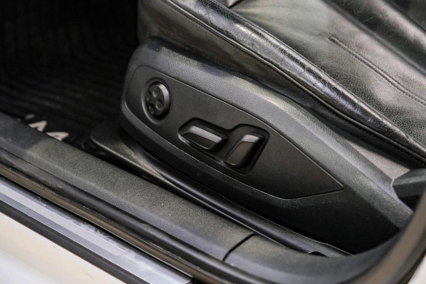 2017 Ibis White /Black Audi A4 2.0T Premium (WAUANAF49HN) with an 2.0L I4 TFSI DOHC engine, Automatic transmission, located at 15300 Midway Rd., Addison, TX, 75001, (972) 702-0011, 32.958321, -96.838074 - 2017 Audi A4 2.0T Premium<br><br>Now Available at Midway Auto Group, Addison, Texas<br><br>Refined, efficient, and unmistakably Audi the 2017 Audi A4 Premium delivers a luxury driving experience with smooth turbocharged performance, a high-quality interior, and advanced technology throughout. With c - Photo#41