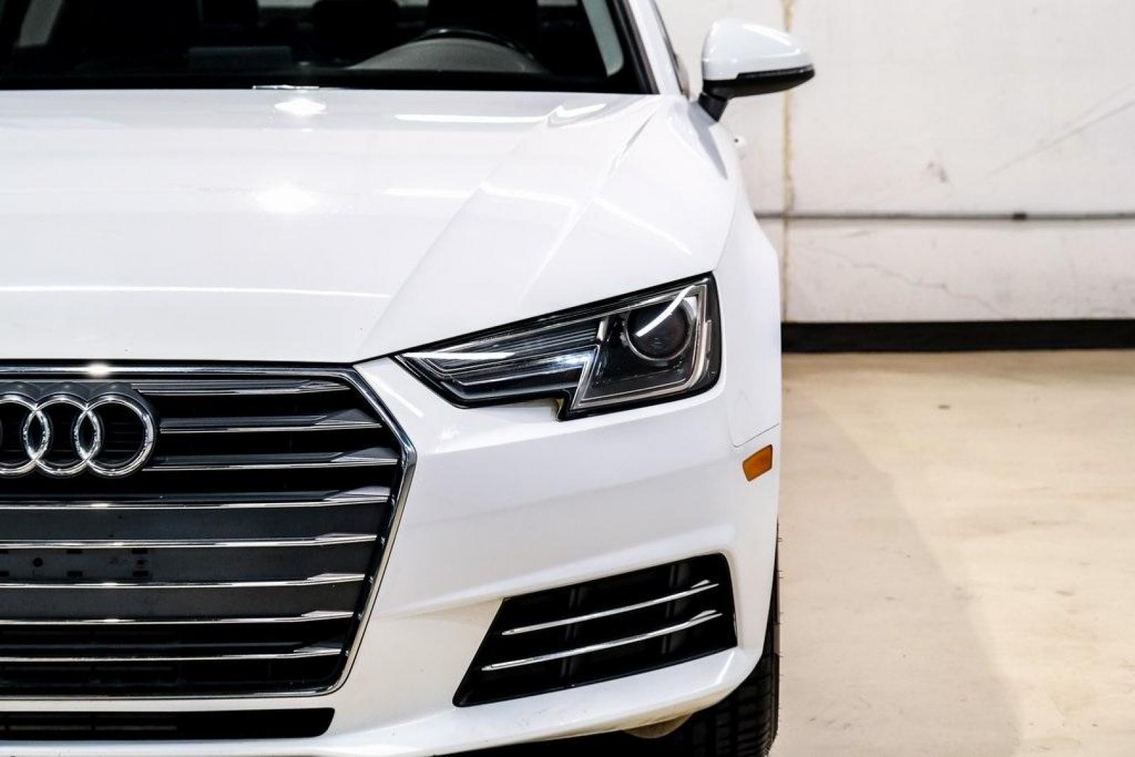 2017 Ibis White /Black Audi A4 2.0T Premium (WAUANAF49HN) with an 2.0L I4 TFSI DOHC engine, Automatic transmission, located at 15300 Midway Rd., Addison, TX, 75001, (972) 702-0011, 32.958321, -96.838074 - 2017 Audi A4 2.0T Premium<br><br>Now Available at Midway Auto Group, Addison, Texas<br><br>Refined, efficient, and unmistakably Audi the 2017 Audi A4 Premium delivers a luxury driving experience with smooth turbocharged performance, a high-quality interior, and advanced technology throughout. With c - Photo#56