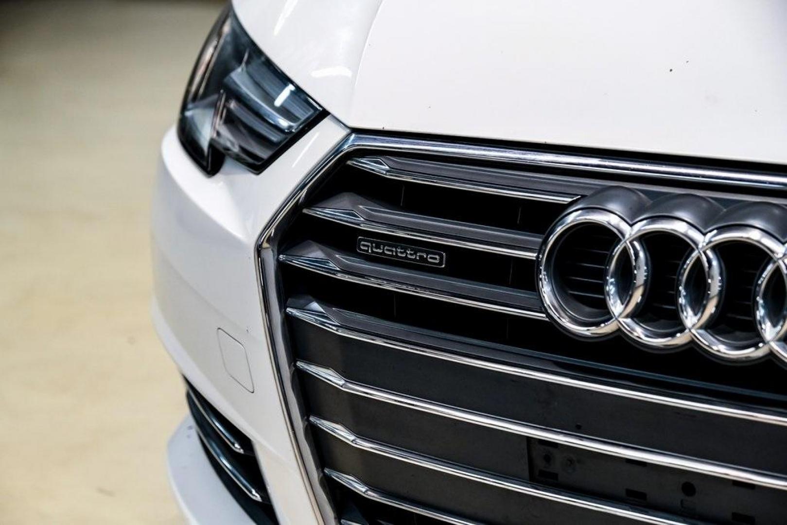 2017 Ibis White /Black Audi A4 2.0T Premium (WAUANAF49HN) with an 2.0L I4 TFSI DOHC engine, Automatic transmission, located at 15300 Midway Rd., Addison, TX, 75001, (972) 702-0011, 32.958321, -96.838074 - 2017 Audi A4 2.0T Premium<br><br>Now Available at Midway Auto Group, Addison, Texas<br><br>Refined, efficient, and unmistakably Audi the 2017 Audi A4 Premium delivers a luxury driving experience with smooth turbocharged performance, a high-quality interior, and advanced technology throughout. With c - Photo#58