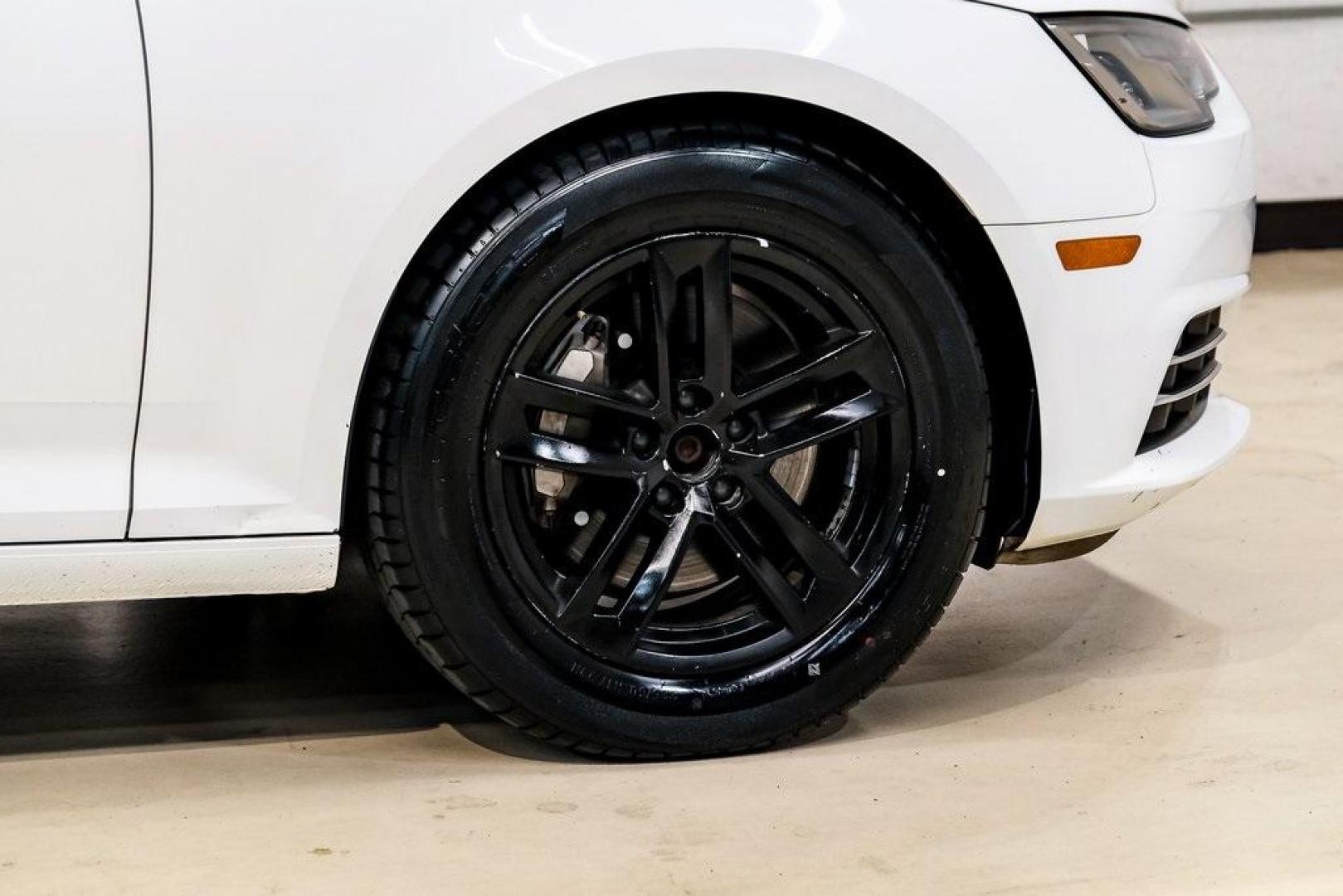2017 Ibis White /Black Audi A4 2.0T Premium (WAUANAF49HN) with an 2.0L I4 TFSI DOHC engine, Automatic transmission, located at 15300 Midway Rd., Addison, TX, 75001, (972) 702-0011, 32.958321, -96.838074 - 2017 Audi A4 2.0T Premium<br><br>Now Available at Midway Auto Group, Addison, Texas<br><br>Refined, efficient, and unmistakably Audi the 2017 Audi A4 Premium delivers a luxury driving experience with smooth turbocharged performance, a high-quality interior, and advanced technology throughout. With c - Photo#66