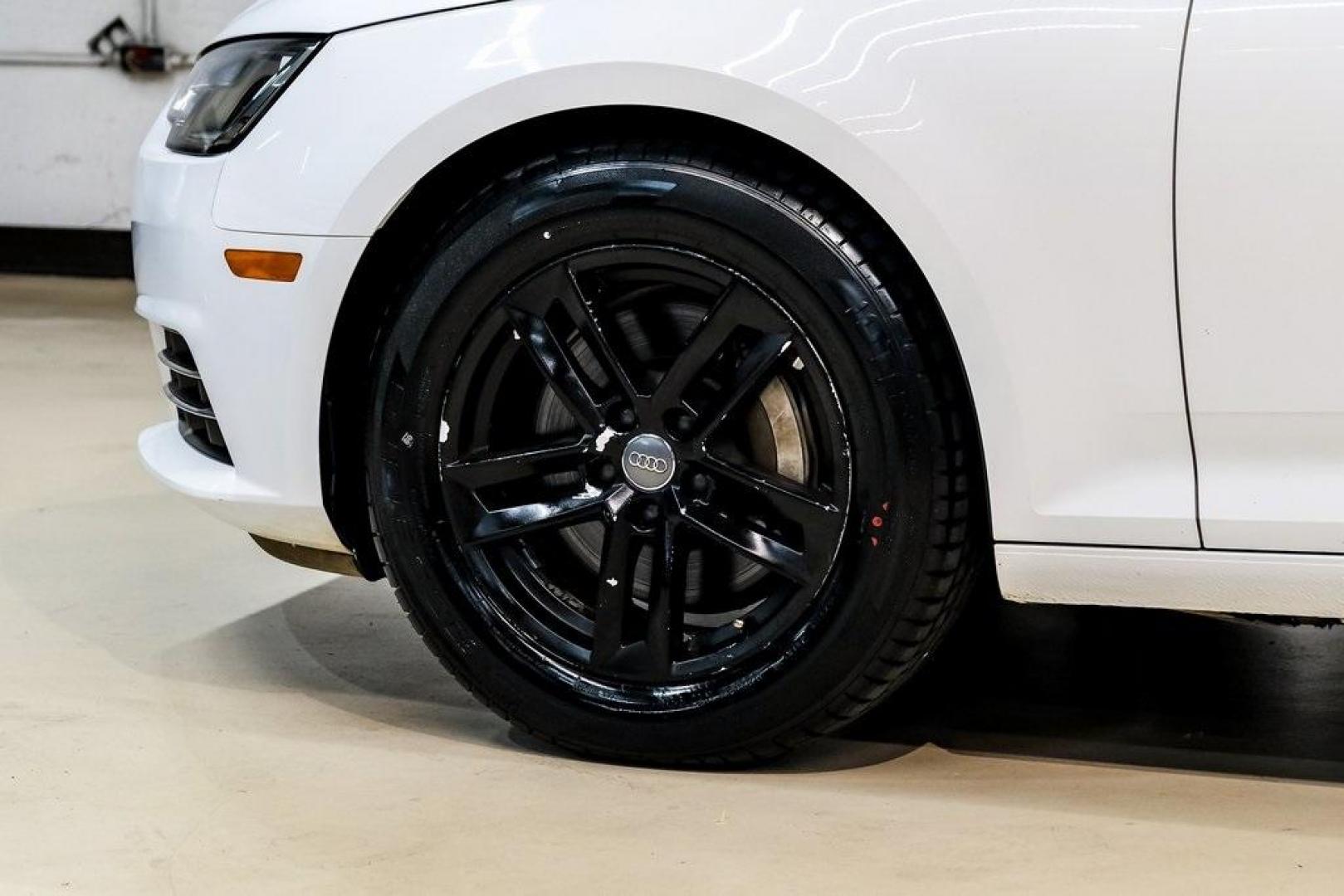 2017 Ibis White /Black Audi A4 2.0T Premium (WAUANAF49HN) with an 2.0L I4 TFSI DOHC engine, Automatic transmission, located at 15300 Midway Rd., Addison, TX, 75001, (972) 702-0011, 32.958321, -96.838074 - 2017 Audi A4 2.0T Premium<br><br>Now Available at Midway Auto Group, Addison, Texas<br><br>Refined, efficient, and unmistakably Audi the 2017 Audi A4 Premium delivers a luxury driving experience with smooth turbocharged performance, a high-quality interior, and advanced technology throughout. With c - Photo#67