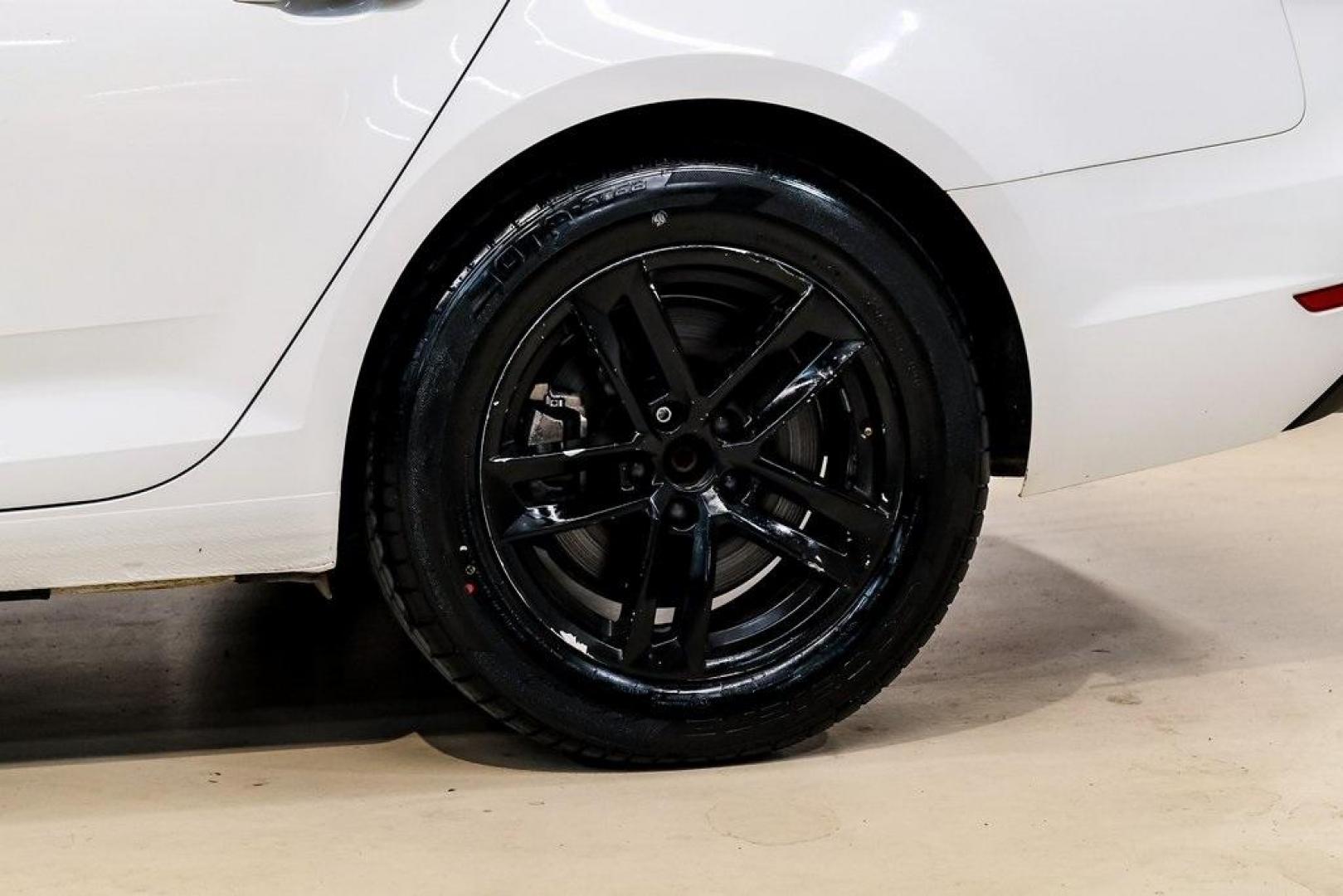 2017 Ibis White /Black Audi A4 2.0T Premium (WAUANAF49HN) with an 2.0L I4 TFSI DOHC engine, Automatic transmission, located at 15300 Midway Rd., Addison, TX, 75001, (972) 702-0011, 32.958321, -96.838074 - 2017 Audi A4 2.0T Premium<br><br>Now Available at Midway Auto Group, Addison, Texas<br><br>Refined, efficient, and unmistakably Audi the 2017 Audi A4 Premium delivers a luxury driving experience with smooth turbocharged performance, a high-quality interior, and advanced technology throughout. With c - Photo#68