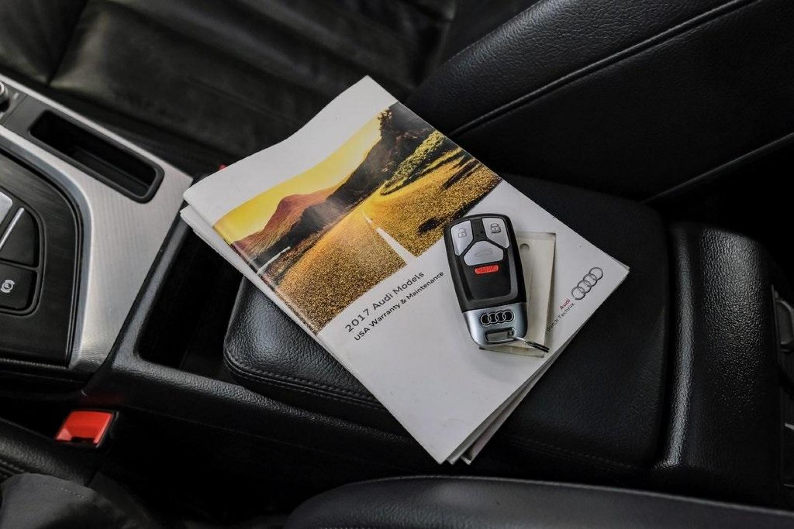 2017 Ibis White /Black Audi A4 2.0T Premium (WAUANAF49HN) with an 2.0L I4 TFSI DOHC engine, Automatic transmission, located at 15300 Midway Rd., Addison, TX, 75001, (972) 702-0011, 32.958321, -96.838074 - 2017 Audi A4 2.0T Premium<br><br>Now Available at Midway Auto Group, Addison, Texas<br><br>Refined, efficient, and unmistakably Audi the 2017 Audi A4 Premium delivers a luxury driving experience with smooth turbocharged performance, a high-quality interior, and advanced technology throughout. With c - Photo#69