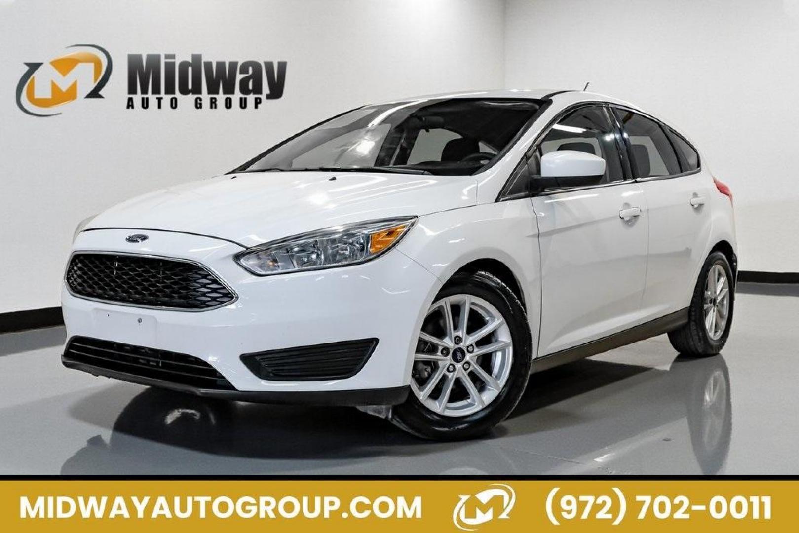 2018 Oxford White /Black Ford Focus SE (1FADP3K23JL) with an 2.0L I4 DGI Ti-VCT engine, Automatic transmission, located at 15300 Midway Rd., Addison, TX, 75001, (972) 702-0011, 32.958321, -96.838074 - Photo#0