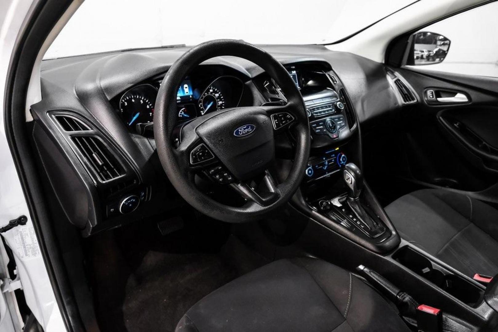 2018 Oxford White /Black Ford Focus SE (1FADP3K23JL) with an 2.0L I4 DGI Ti-VCT engine, Automatic transmission, located at 15300 Midway Rd., Addison, TX, 75001, (972) 702-0011, 32.958321, -96.838074 - Photo#14