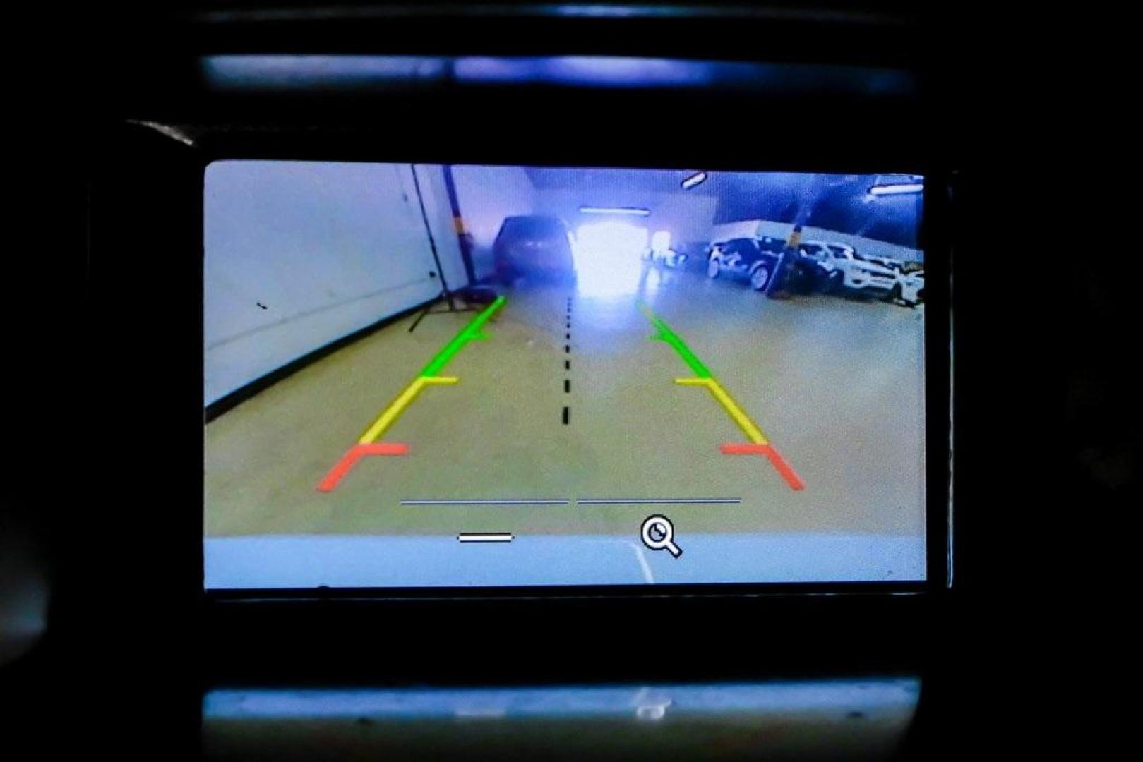 2018 Oxford White /Black Ford Focus SE (1FADP3K23JL) with an 2.0L I4 DGI Ti-VCT engine, Automatic transmission, located at 15300 Midway Rd., Addison, TX, 75001, (972) 702-0011, 32.958321, -96.838074 - Photo#18