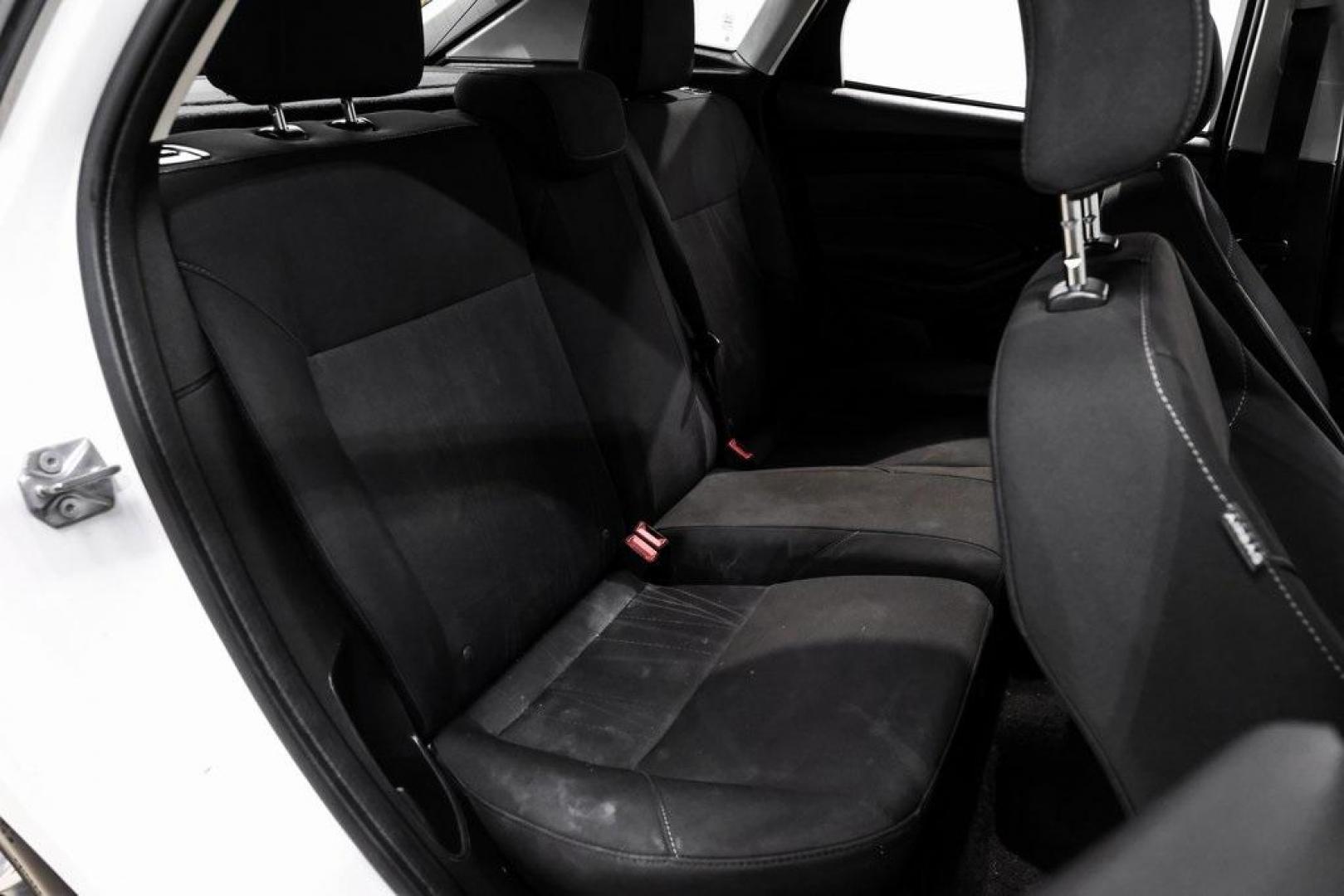 2018 Oxford White /Black Ford Focus SE (1FADP3K23JL) with an 2.0L I4 DGI Ti-VCT engine, Automatic transmission, located at 15300 Midway Rd., Addison, TX, 75001, (972) 702-0011, 32.958321, -96.838074 - Photo#27