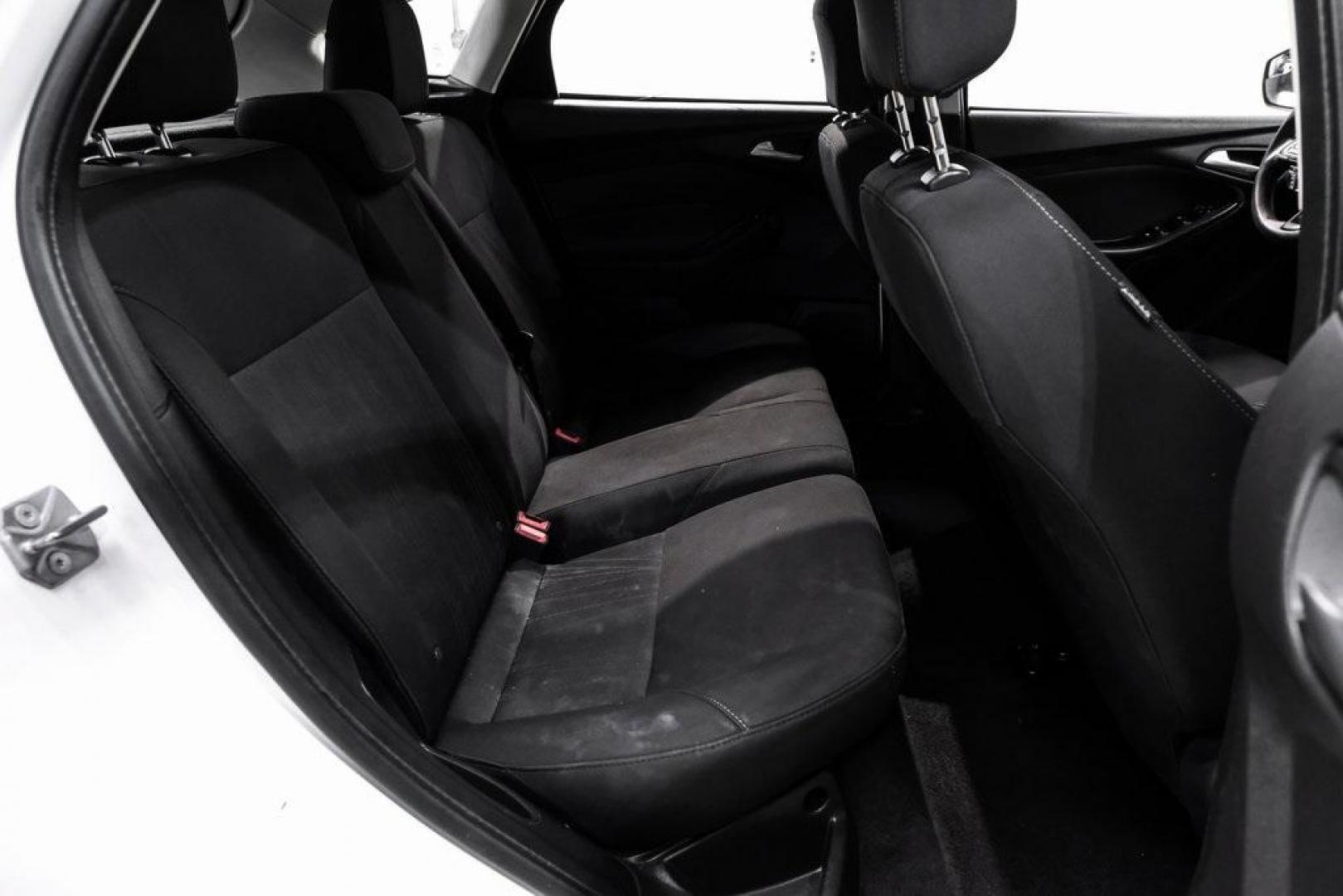 2018 Oxford White /Black Ford Focus SE (1FADP3K23JL) with an 2.0L I4 DGI Ti-VCT engine, Automatic transmission, located at 15300 Midway Rd., Addison, TX, 75001, (972) 702-0011, 32.958321, -96.838074 - Photo#28