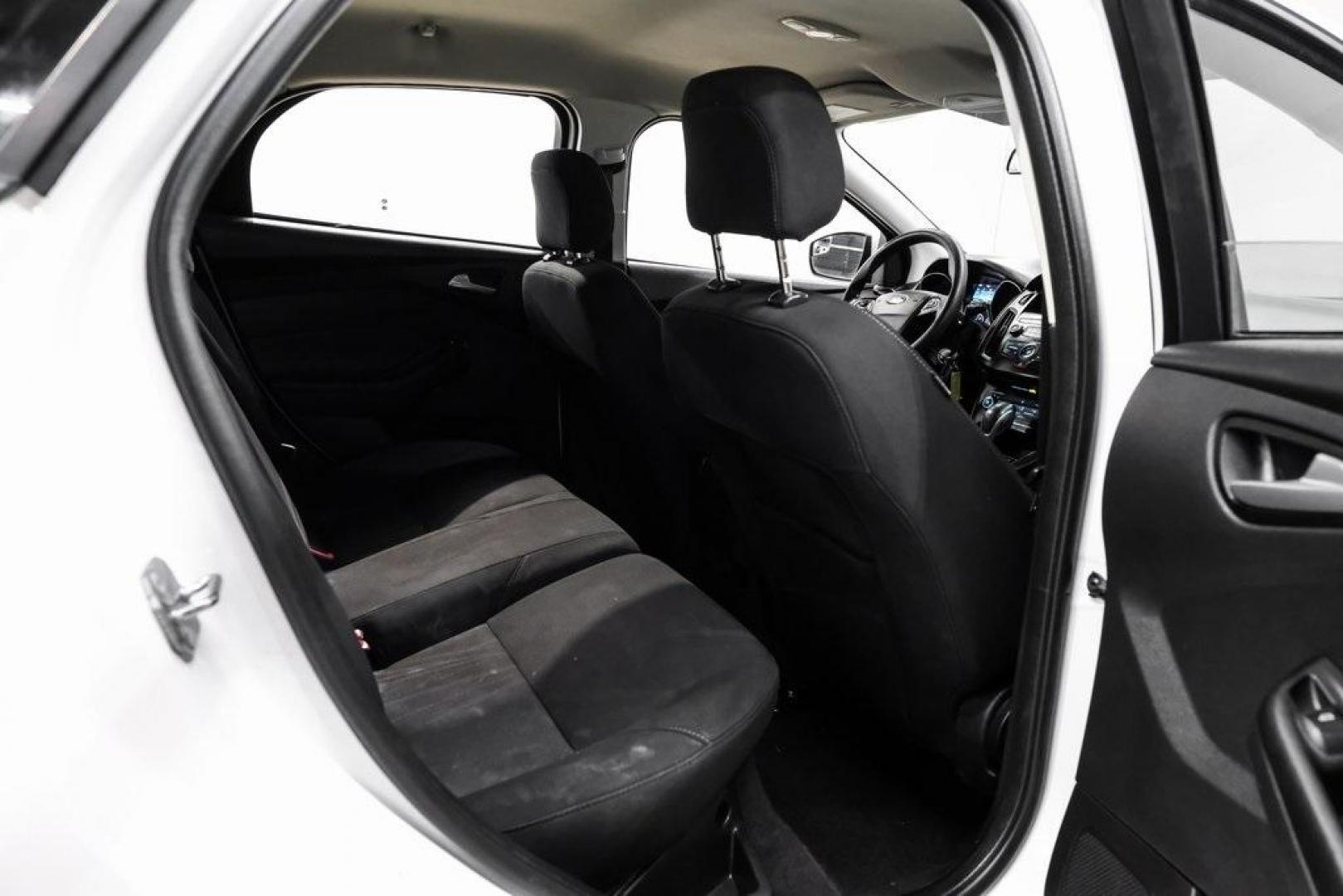 2018 Oxford White /Black Ford Focus SE (1FADP3K23JL) with an 2.0L I4 DGI Ti-VCT engine, Automatic transmission, located at 15300 Midway Rd., Addison, TX, 75001, (972) 702-0011, 32.958321, -96.838074 - Photo#29