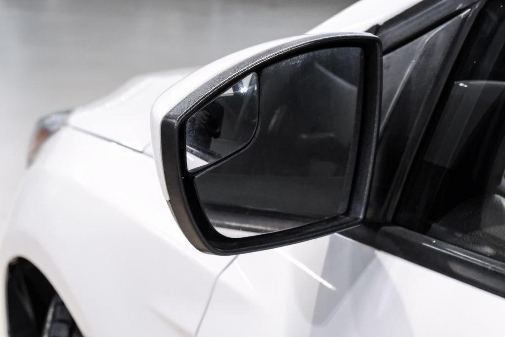 2018 Oxford White /Black Ford Focus SE (1FADP3K23JL) with an 2.0L I4 DGI Ti-VCT engine, Automatic transmission, located at 15300 Midway Rd., Addison, TX, 75001, (972) 702-0011, 32.958321, -96.838074 - Photo#33