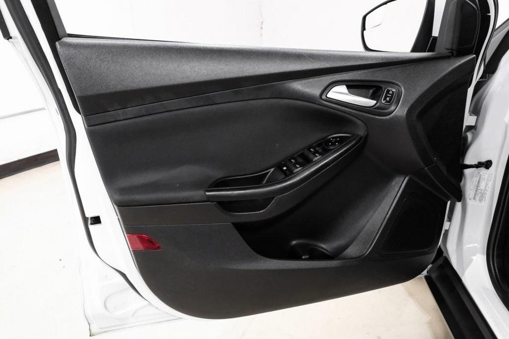 2018 Oxford White /Black Ford Focus SE (1FADP3K23JL) with an 2.0L I4 DGI Ti-VCT engine, Automatic transmission, located at 15300 Midway Rd., Addison, TX, 75001, (972) 702-0011, 32.958321, -96.838074 - Photo#34