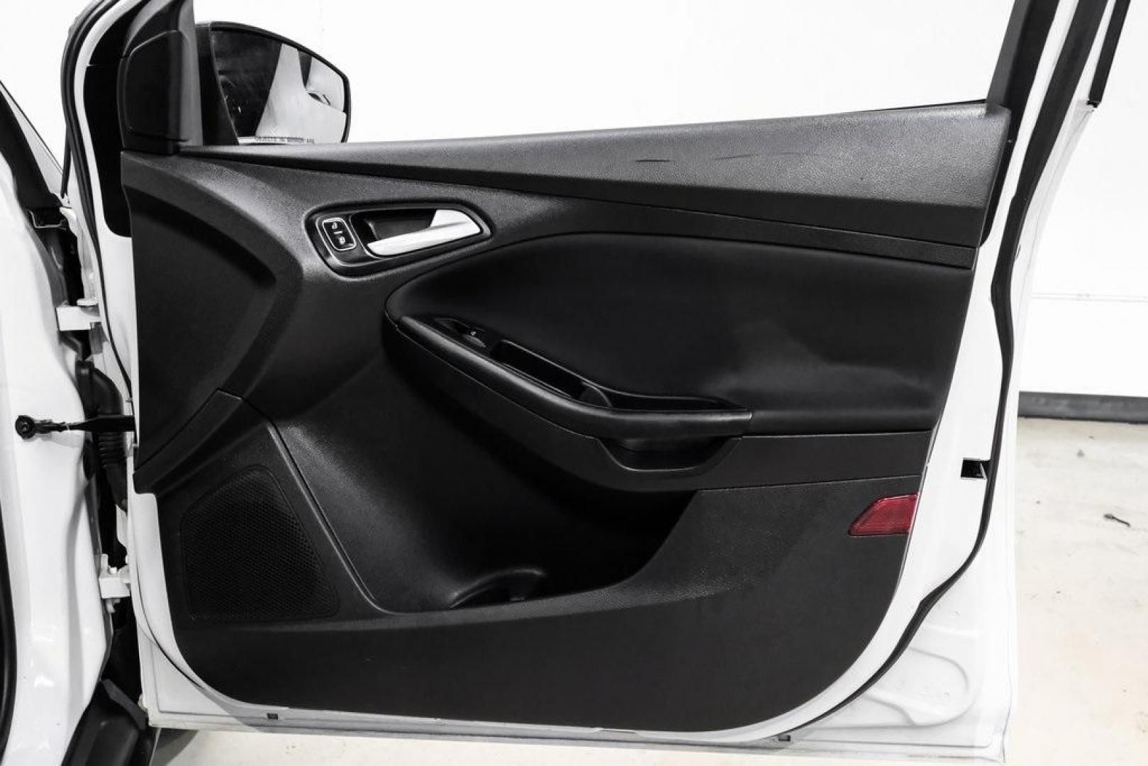 2018 Oxford White /Black Ford Focus SE (1FADP3K23JL) with an 2.0L I4 DGI Ti-VCT engine, Automatic transmission, located at 15300 Midway Rd., Addison, TX, 75001, (972) 702-0011, 32.958321, -96.838074 - Photo#36