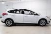2018 Oxford White /Black Ford Focus SE (1FADP3K23JL) with an 2.0L I4 DGI Ti-VCT engine, Automatic transmission, located at 15300 Midway Rd., Addison, TX, 75001, (972) 702-0011, 32.958321, -96.838074 - 2018 Ford Focus SE<br><br>Now Available at Midway Auto Group, Addison, Texas<br><br>Efficient, comfortable, and great for everyday driving the 2018 Ford Focus SE delivers excellent fuel economy, modern technology, and a smooth, enjoyable ride. Whether you're commuting across DFW, shopping for a firs - Photo#5