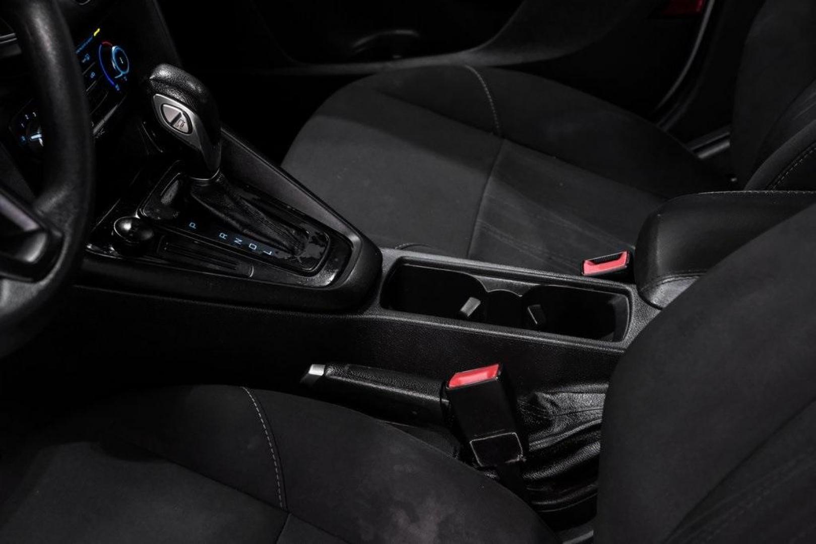 2018 Oxford White /Black Ford Focus SE (1FADP3K23JL) with an 2.0L I4 DGI Ti-VCT engine, Automatic transmission, located at 15300 Midway Rd., Addison, TX, 75001, (972) 702-0011, 32.958321, -96.838074 - 2018 Ford Focus SE<br><br>Now Available at Midway Auto Group, Addison, Texas<br><br>Efficient, comfortable, and great for everyday driving the 2018 Ford Focus SE delivers excellent fuel economy, modern technology, and a smooth, enjoyable ride. Whether you're commuting across DFW, shopping for a firs - Photo#24