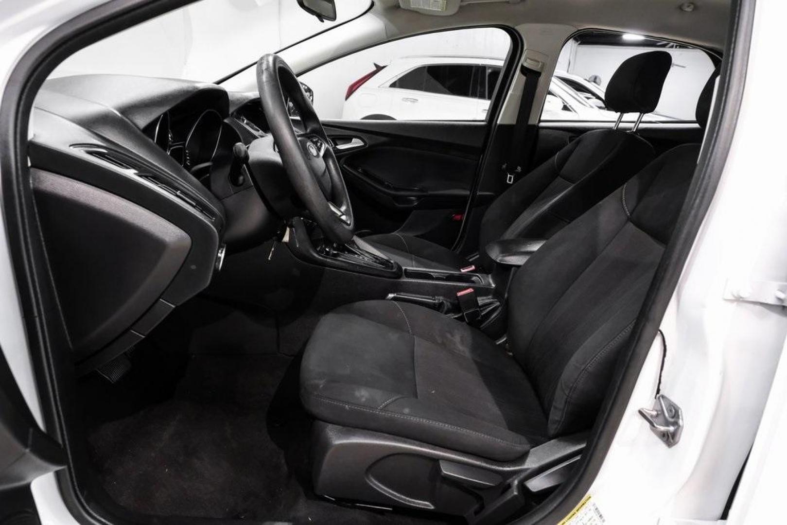 2018 Oxford White /Black Ford Focus SE (1FADP3K23JL) with an 2.0L I4 DGI Ti-VCT engine, Automatic transmission, located at 15300 Midway Rd., Addison, TX, 75001, (972) 702-0011, 32.958321, -96.838074 - 2018 Ford Focus SE<br><br>Now Available at Midway Auto Group, Addison, Texas<br><br>Efficient, comfortable, and great for everyday driving the 2018 Ford Focus SE delivers excellent fuel economy, modern technology, and a smooth, enjoyable ride. Whether you're commuting across DFW, shopping for a firs - Photo#25