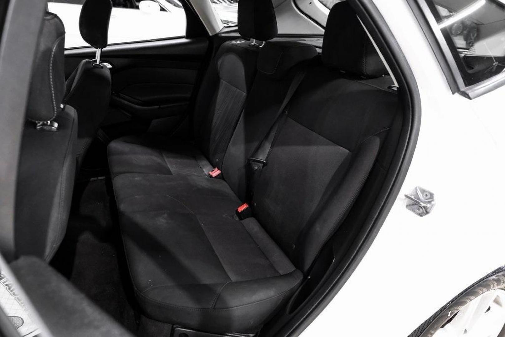 2018 Oxford White /Black Ford Focus SE (1FADP3K23JL) with an 2.0L I4 DGI Ti-VCT engine, Automatic transmission, located at 15300 Midway Rd., Addison, TX, 75001, (972) 702-0011, 32.958321, -96.838074 - 2018 Ford Focus SE<br><br>Now Available at Midway Auto Group, Addison, Texas<br><br>Efficient, comfortable, and great for everyday driving the 2018 Ford Focus SE delivers excellent fuel economy, modern technology, and a smooth, enjoyable ride. Whether you're commuting across DFW, shopping for a firs - Photo#31