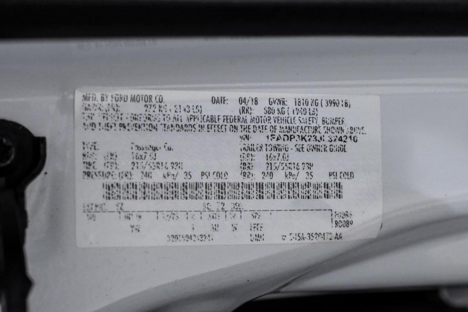 2018 Oxford White /Black Ford Focus SE (1FADP3K23JL) with an 2.0L I4 DGI Ti-VCT engine, Automatic transmission, located at 15300 Midway Rd., Addison, TX, 75001, (972) 702-0011, 32.958321, -96.838074 - 2018 Ford Focus SE<br><br>Now Available at Midway Auto Group, Addison, Texas<br><br>Efficient, comfortable, and great for everyday driving the 2018 Ford Focus SE delivers excellent fuel economy, modern technology, and a smooth, enjoyable ride. Whether you're commuting across DFW, shopping for a firs - Photo#48