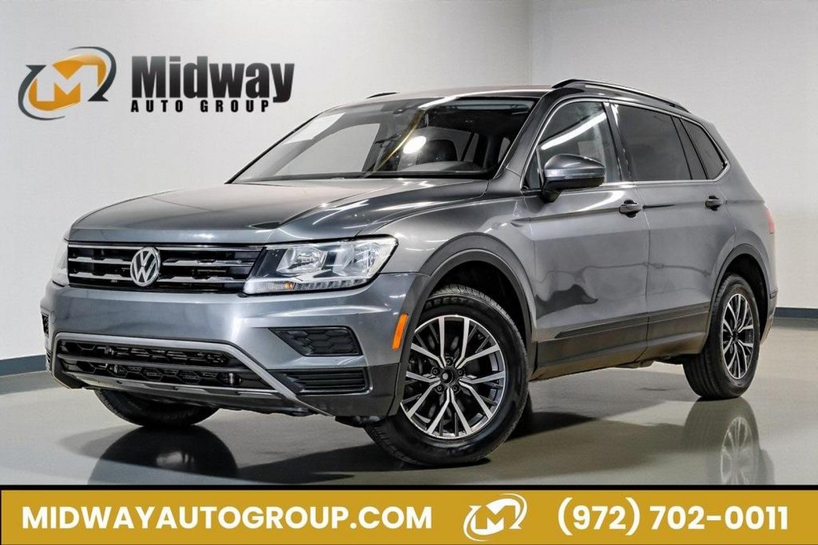 2019 Platinum Gray Metallic /Titan Black Volkswagen Tiguan 2.0T SE (3VV3B7AX8KM) with an 2.0L TSI DOHC engine, Automatic transmission, located at 15300 Midway Rd., Addison, TX, 75001, (972) 702-0011, 32.958321, -96.838074 - Photo#0