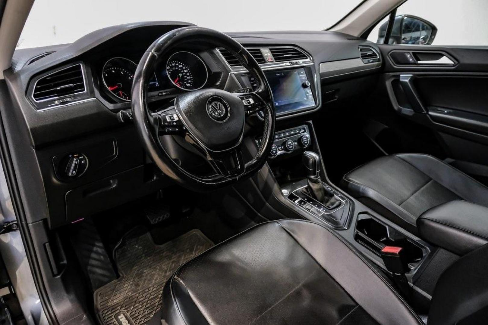 2019 Platinum Gray Metallic /Titan Black Volkswagen Tiguan 2.0T SE (3VV3B7AX8KM) with an 2.0L TSI DOHC engine, Automatic transmission, located at 15300 Midway Rd., Addison, TX, 75001, (972) 702-0011, 32.958321, -96.838074 - Photo#2
