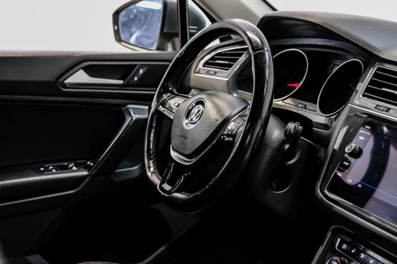 2019 Platinum Gray Metallic /Titan Black Volkswagen Tiguan 2.0T SE (3VV3B7AX8KM) with an 2.0L TSI DOHC engine, Automatic transmission, located at 15300 Midway Rd., Addison, TX, 75001, (972) 702-0011, 32.958321, -96.838074 - Photo#19