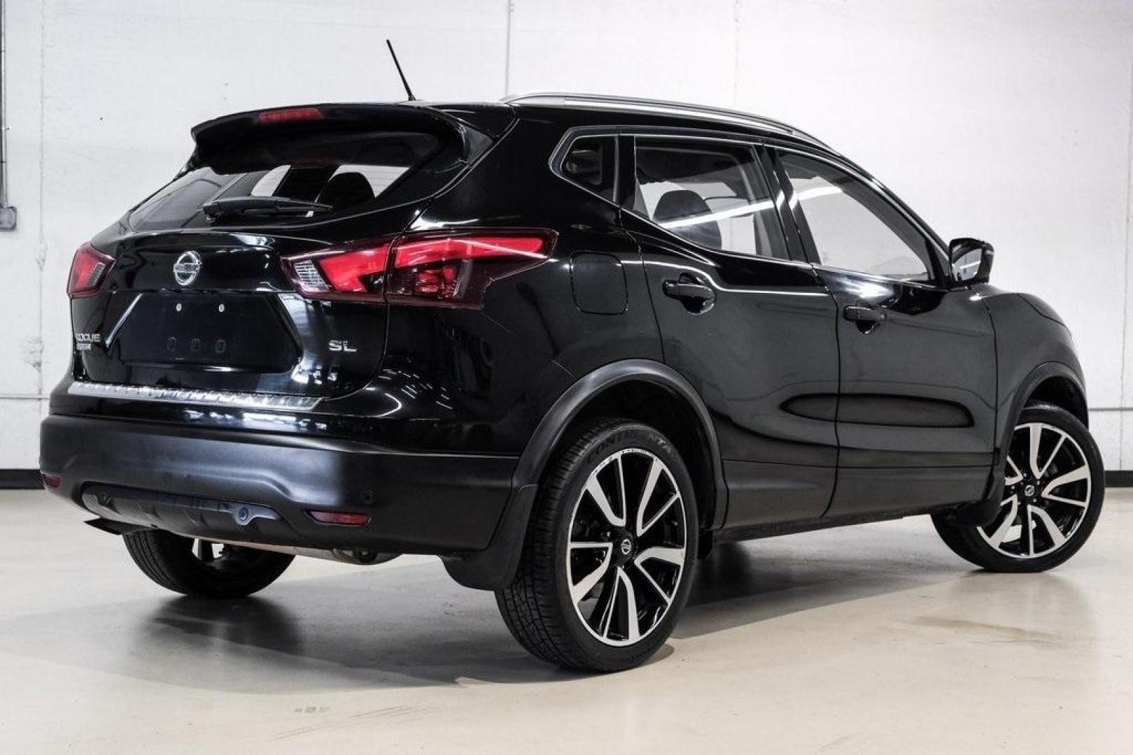2019 Magnetic Black Pearl /Charcoal Nissan Rogue Sport SL (JN1BJ1CP4KW) with an 2.0L DOHC engine, CVT transmission, located at 15300 Midway Rd., Addison, TX, 75001, (972) 702-0011, 32.958321, -96.838074 - Photo#8