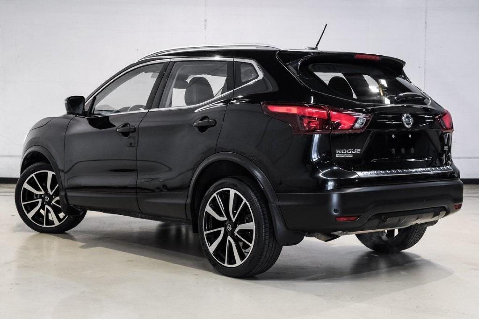 2019 Magnetic Black Pearl /Charcoal Nissan Rogue Sport SL (JN1BJ1CP4KW) with an 2.0L DOHC engine, CVT transmission, located at 15300 Midway Rd., Addison, TX, 75001, (972) 702-0011, 32.958321, -96.838074 - Photo#10