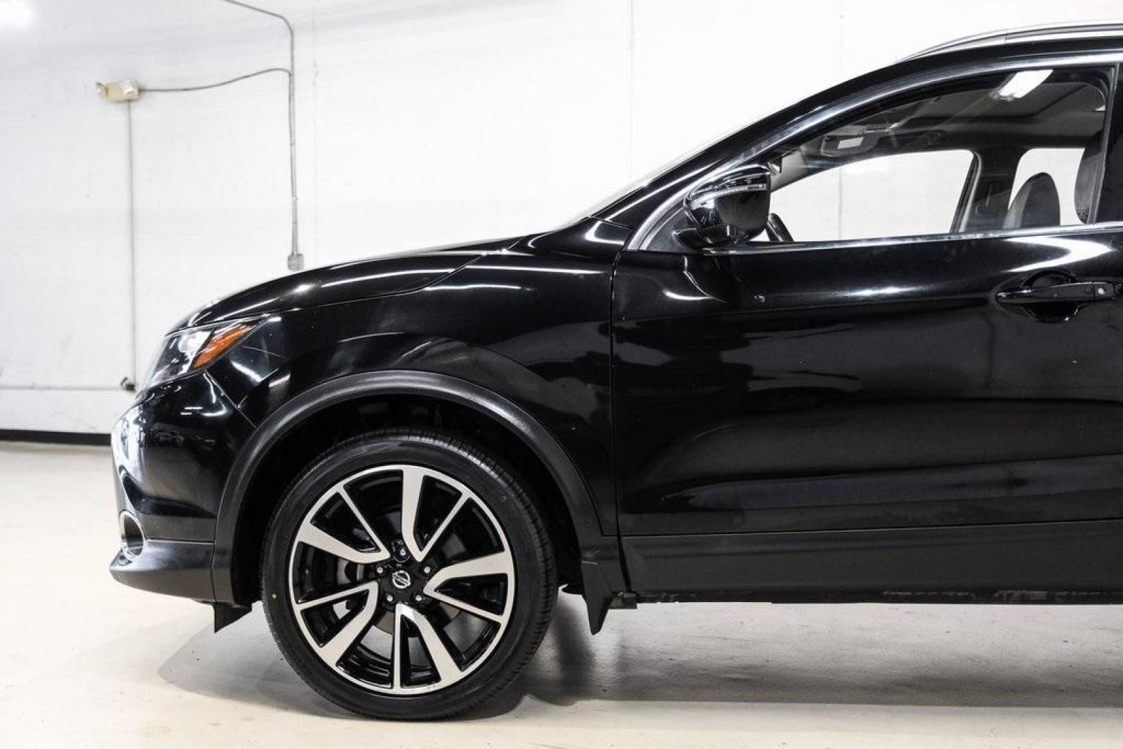 2019 Magnetic Black Pearl /Charcoal Nissan Rogue Sport SL (JN1BJ1CP4KW) with an 2.0L DOHC engine, CVT transmission, located at 15300 Midway Rd., Addison, TX, 75001, (972) 702-0011, 32.958321, -96.838074 - Photo#12