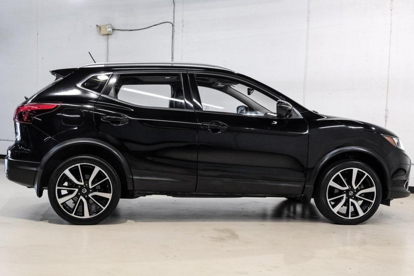 2019 Magnetic Black Pearl /Charcoal Nissan Rogue Sport SL (JN1BJ1CP4KW) with an 2.0L DOHC engine, CVT transmission, located at 15300 Midway Rd., Addison, TX, 75001, (972) 702-0011, 32.958321, -96.838074 - 2019 Nissan Rogue Sport SL<br><br>Now Available at Midway Auto Group, Addison, Texas<br><br>Premium, efficient, and loaded with features the 2019 Nissan Rogue Sport SL is the top-tier trim in the Rogue Sport lineup, offering leather seating, advanced driver-assist technologies, and a refined driving - Photo#7