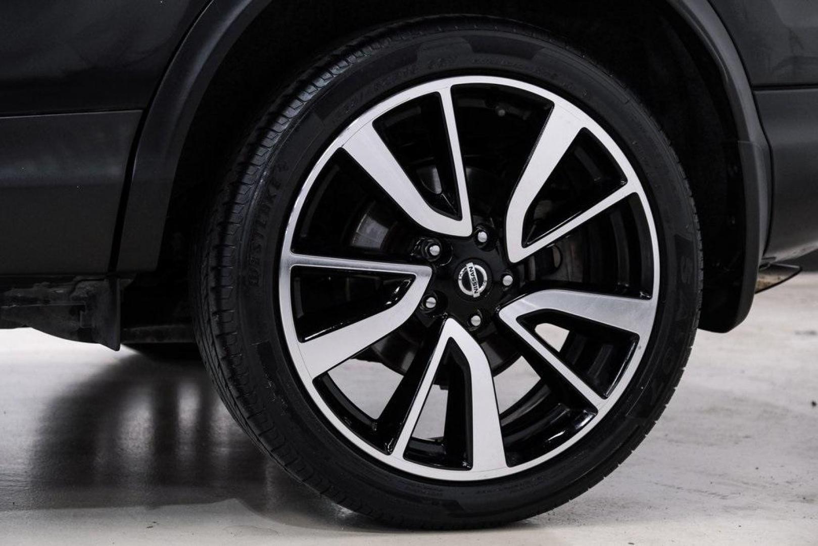 2019 Magnetic Black Pearl /Charcoal Nissan Rogue Sport SL (JN1BJ1CP4KW) with an 2.0L DOHC engine, CVT transmission, located at 15300 Midway Rd., Addison, TX, 75001, (972) 702-0011, 32.958321, -96.838074 - 2019 Nissan Rogue Sport SL<br><br>Now Available at Midway Auto Group, Addison, Texas<br><br>Premium, efficient, and loaded with features the 2019 Nissan Rogue Sport SL is the top-tier trim in the Rogue Sport lineup, offering leather seating, advanced driver-assist technologies, and a refined driving - Photo#58