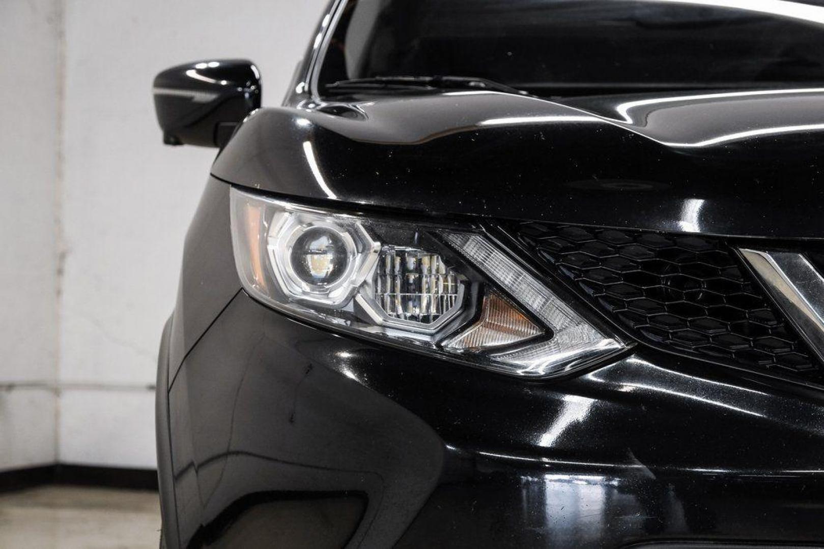 2019 Magnetic Black Pearl /Charcoal Nissan Rogue Sport SL (JN1BJ1CP4KW) with an 2.0L DOHC engine, CVT transmission, located at 15300 Midway Rd., Addison, TX, 75001, (972) 702-0011, 32.958321, -96.838074 - Photo#52