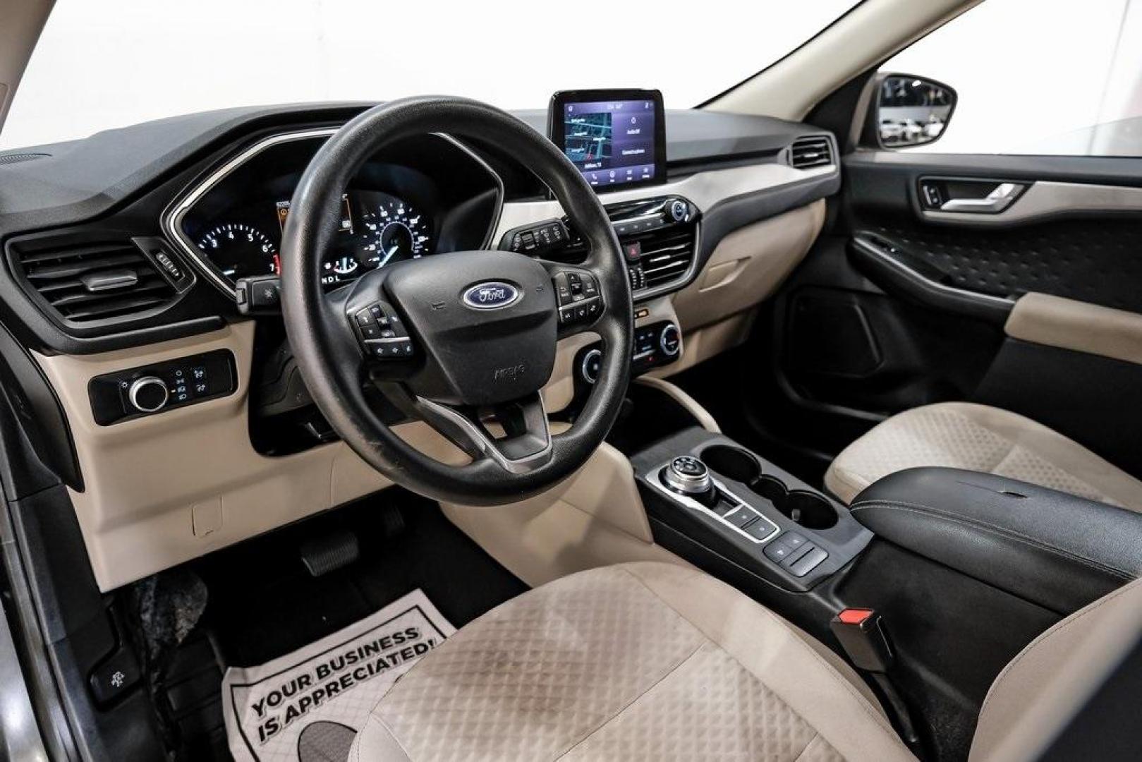 2020 Magnetic /Sandstone Ford Escape SE (1FMCU0G6XLU) with an 1.5L EcoBoost engine, Automatic transmission, located at 15300 Midway Rd., Addison, TX, 75001, (972) 702-0011, 32.958321, -96.838074 - Photo#2