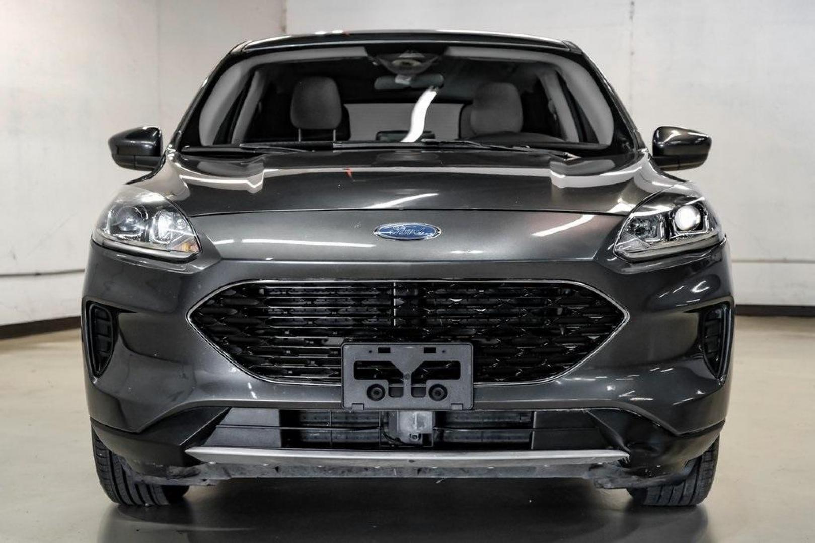 2020 Magnetic /Sandstone Ford Escape SE (1FMCU0G6XLU) with an 1.5L EcoBoost engine, Automatic transmission, located at 15300 Midway Rd., Addison, TX, 75001, (972) 702-0011, 32.958321, -96.838074 - Photo#6