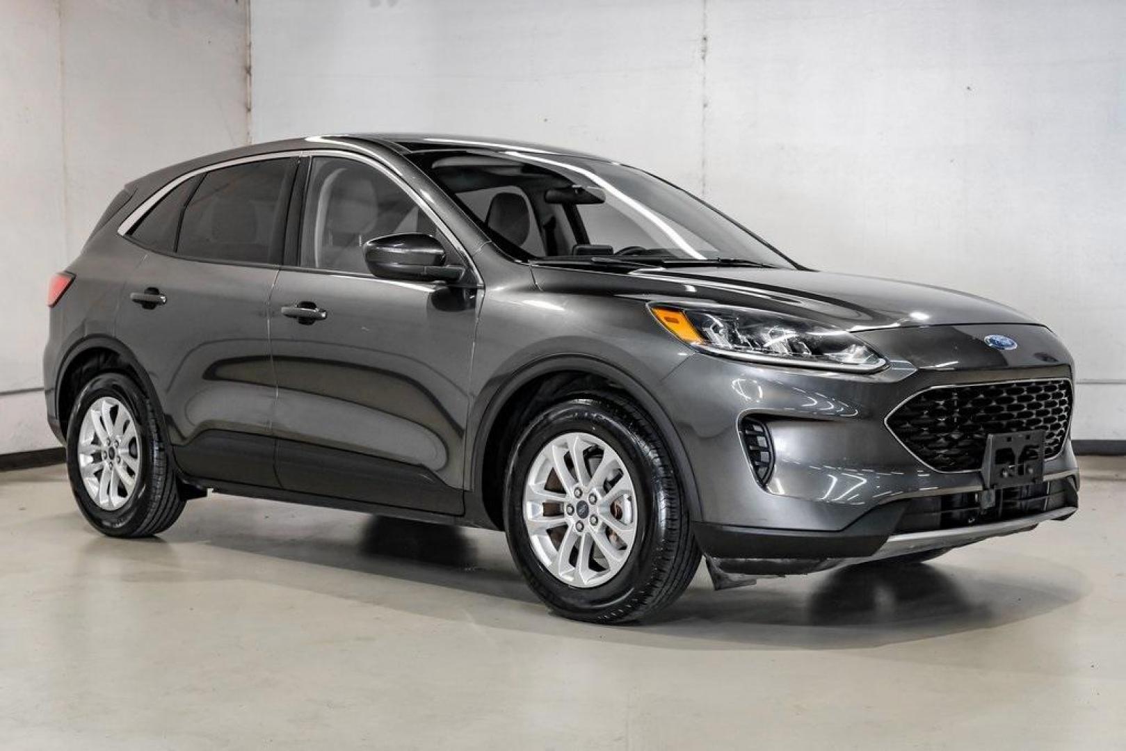 2020 Magnetic /Sandstone Ford Escape SE (1FMCU0G6XLU) with an 1.5L EcoBoost engine, Automatic transmission, located at 15300 Midway Rd., Addison, TX, 75001, (972) 702-0011, 32.958321, -96.838074 - Photo#7