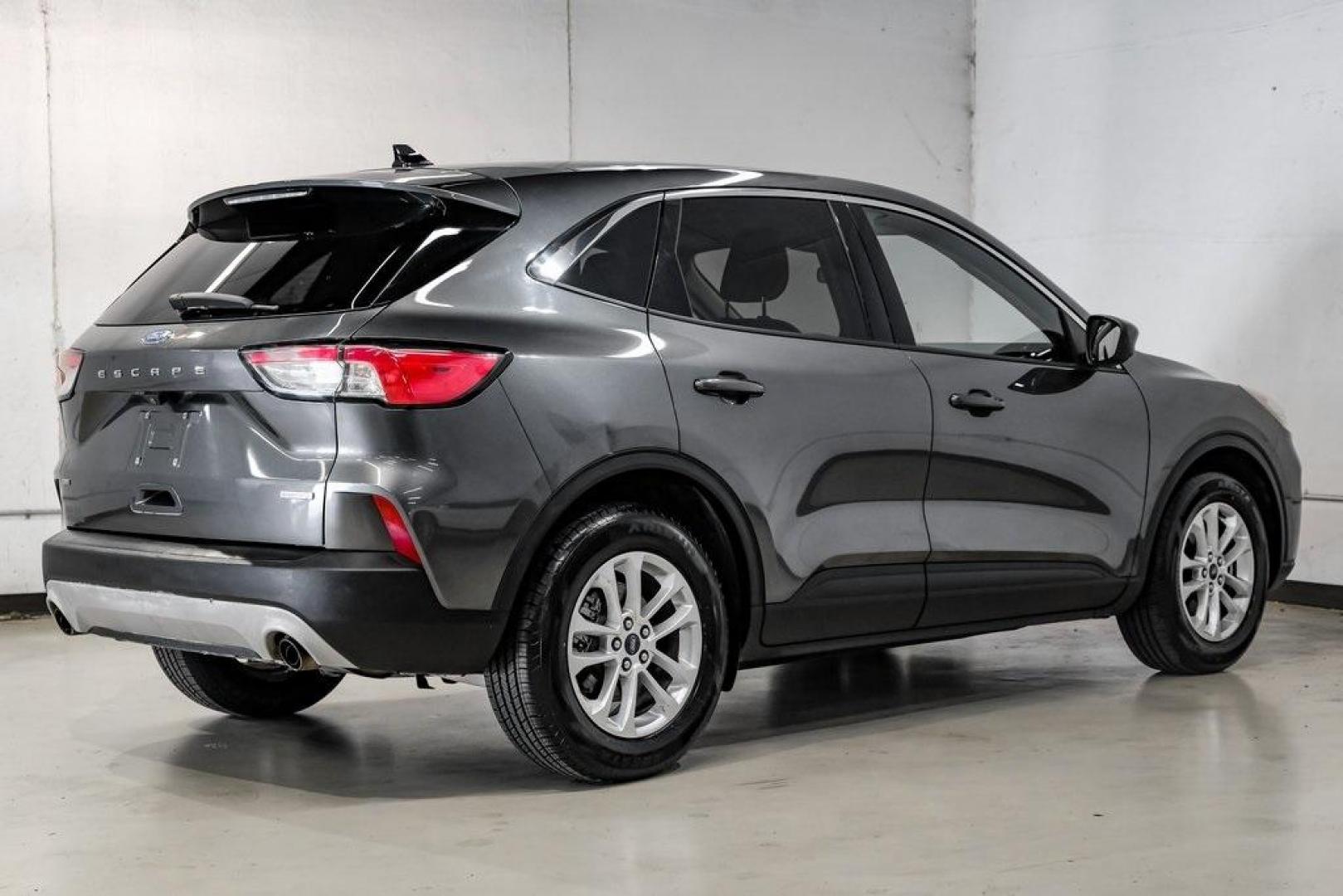 2020 Magnetic /Sandstone Ford Escape SE (1FMCU0G6XLU) with an 1.5L EcoBoost engine, Automatic transmission, located at 15300 Midway Rd., Addison, TX, 75001, (972) 702-0011, 32.958321, -96.838074 - Photo#11